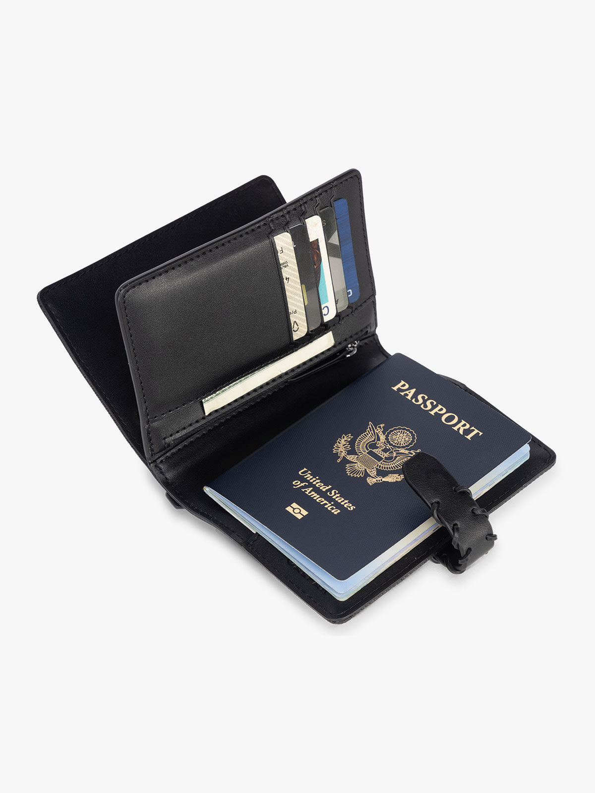Opened with passport with card slots of CALPAK Colette Multi Passport Wallet in Black canvas material; CLPW2601-BLACK