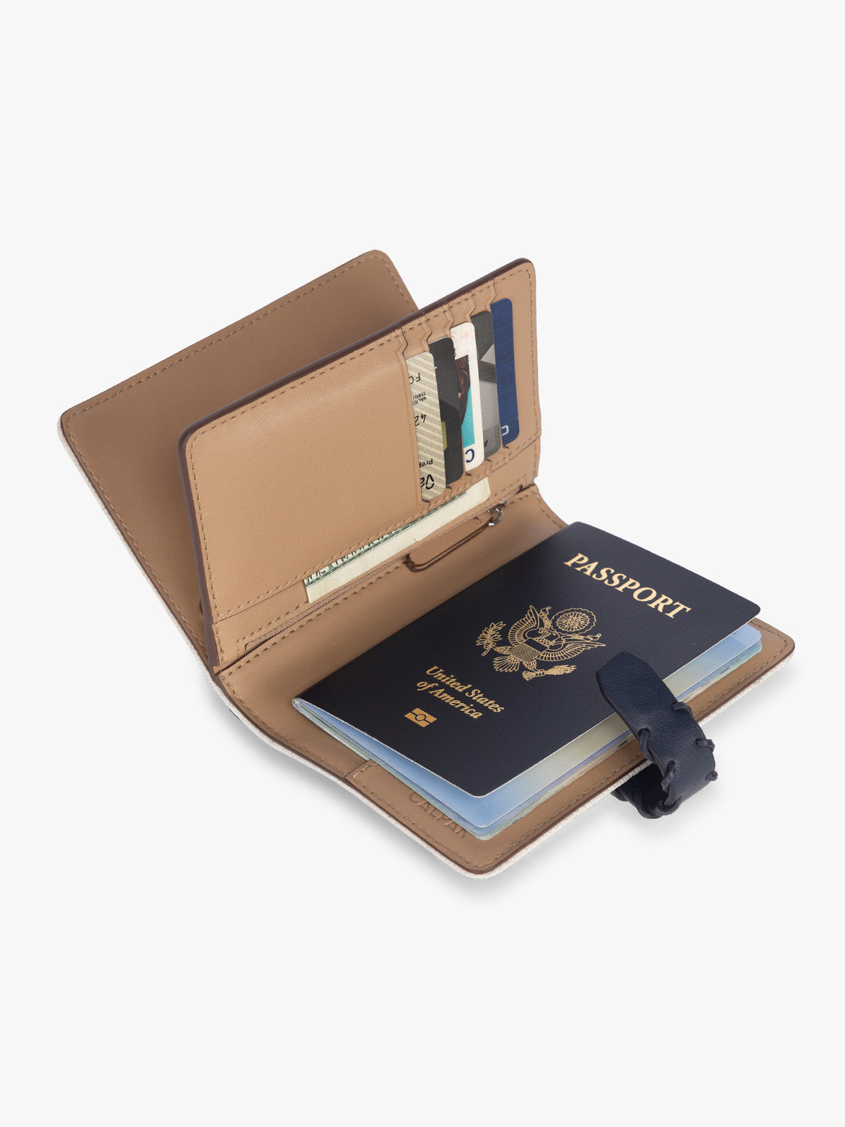 Opened with passport and card slots of CALPAK Colette Multi Passport Wallet in beige canvas material and blue finishings in Natural Navy; CLPW2601-NATURAL-NAVY
