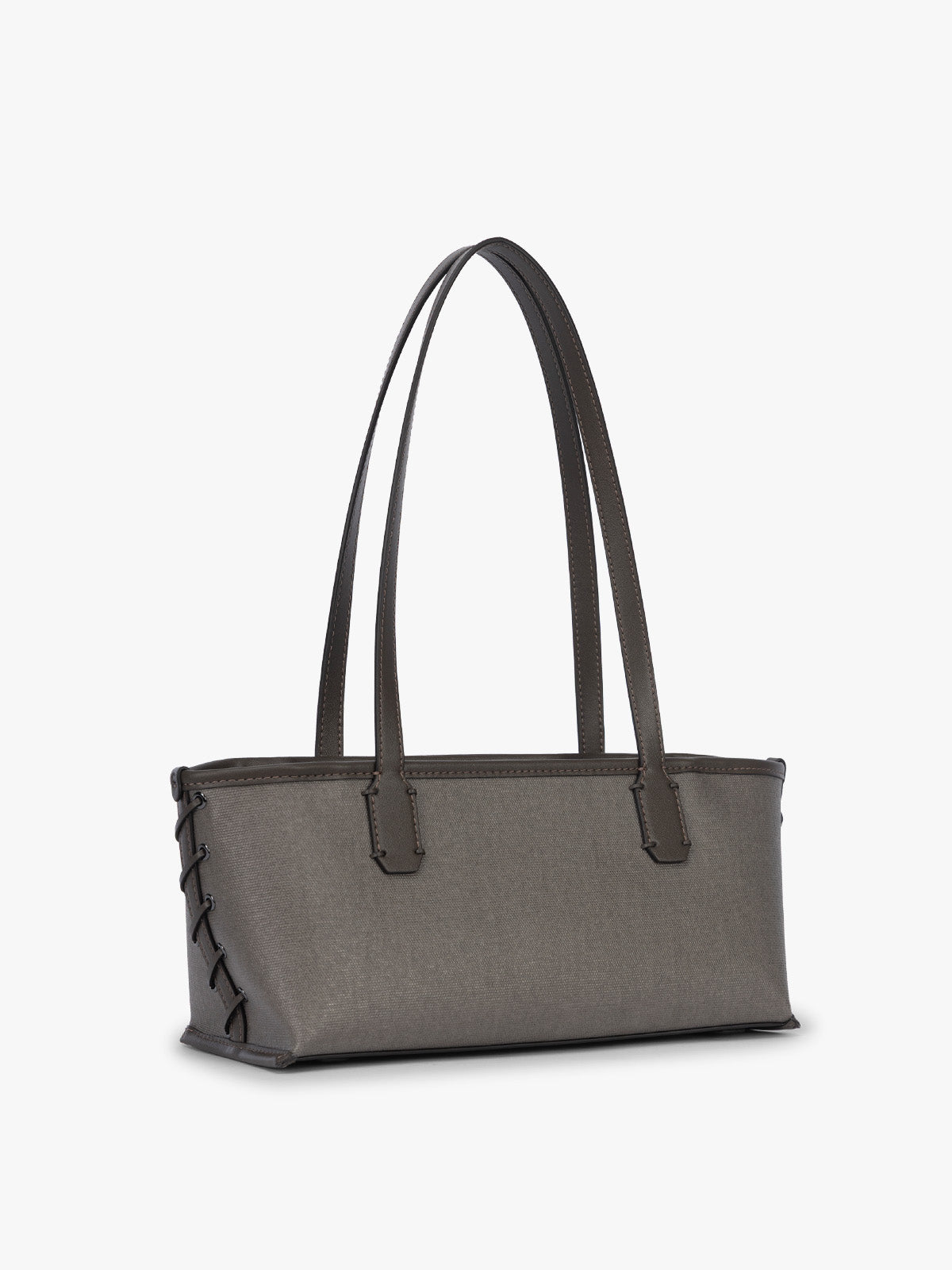 Side view and stitching of CALPAK Colette Canvas Shoulder Tote in brown Mushroom canvas material and side hand-finished stitch; CLST2601-MUSHROOM