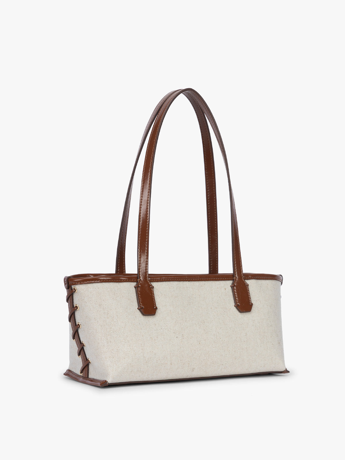 Side view with stitching of CALPAK Colette Canvas Shoulder Tote in beige canvas material and side with hand-finished brown stitch and finishing; CLST2601-NATURAL-BROWN