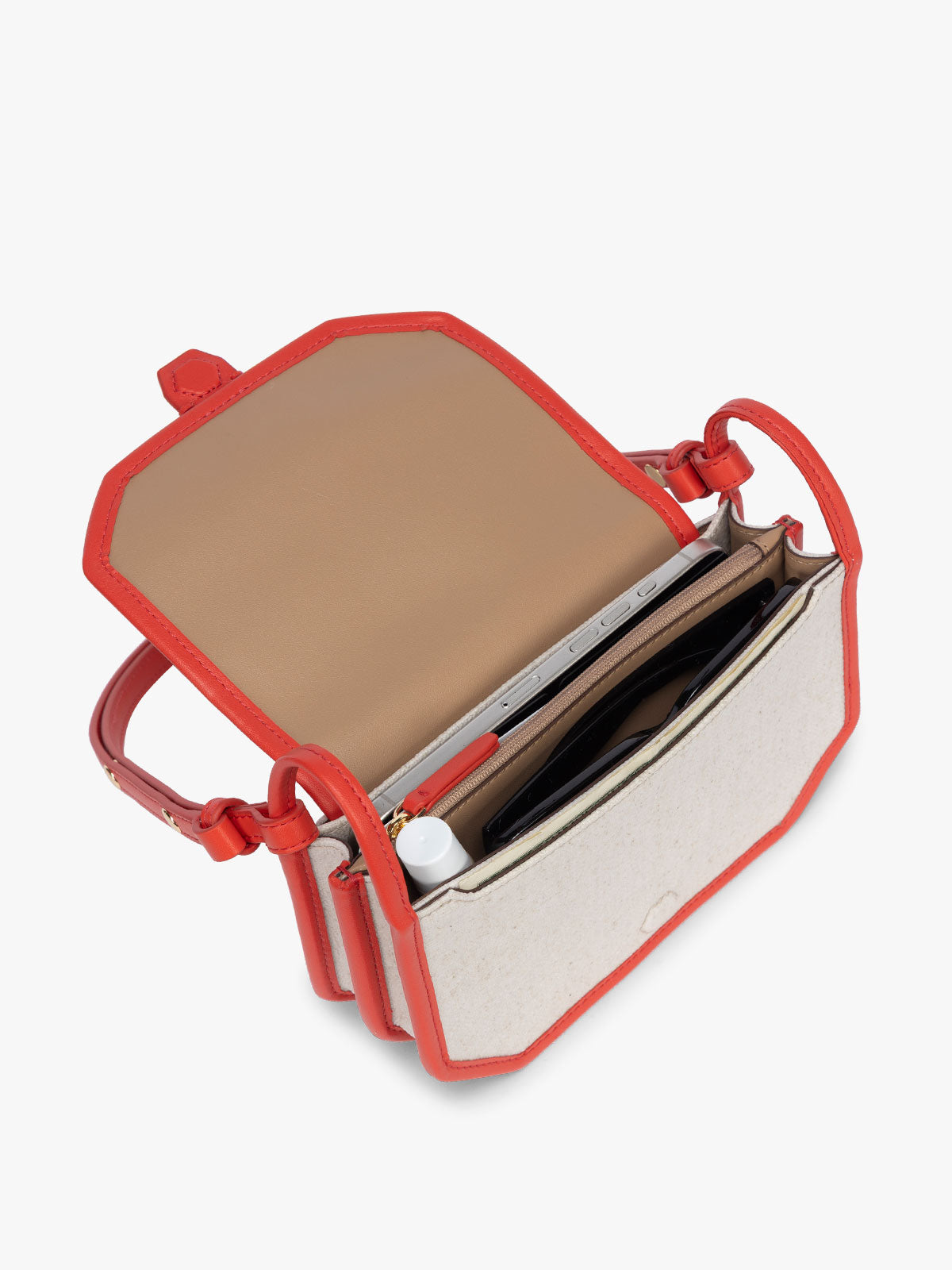 Opened CALPAK Colette Canvas Crossbody Wallet Bag in Natural Brown with beige canvas material and red finishing; CLWC2601-NATURAL-TOMATO