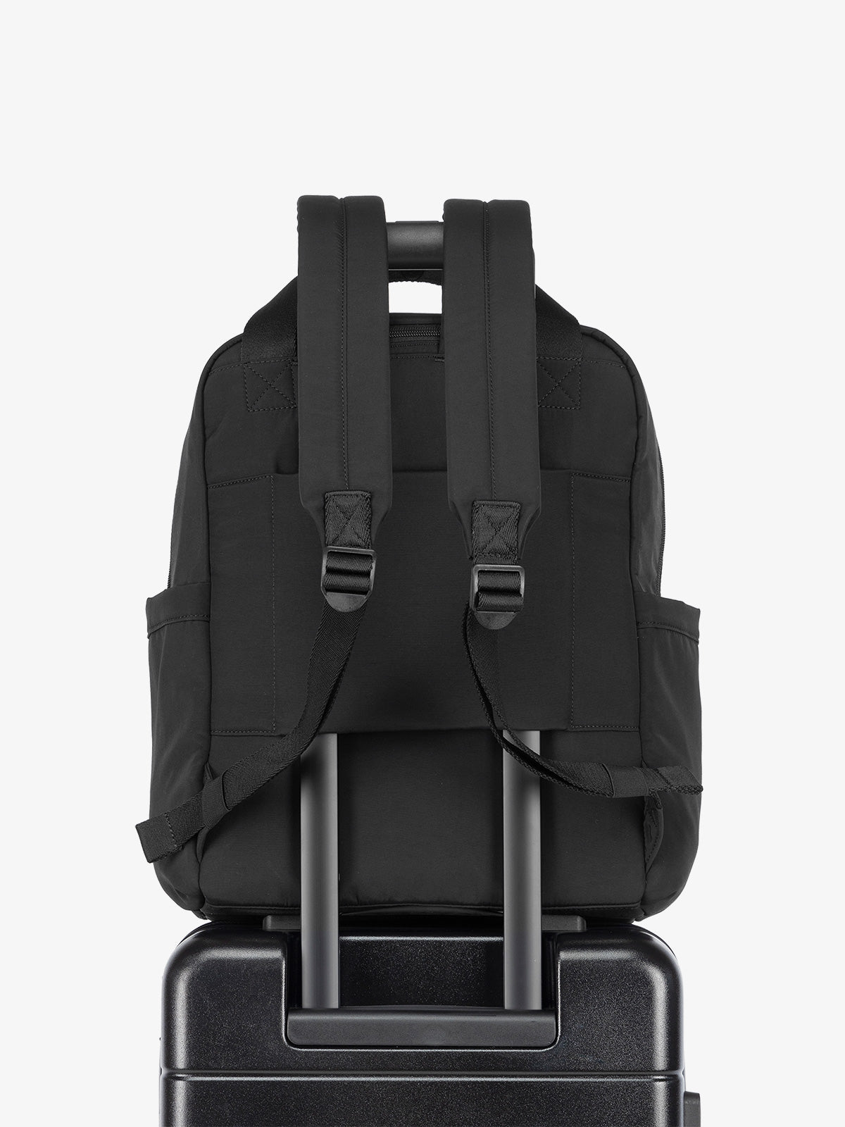 Luggage trolley sleeve of CALPAK Connect Laptop Backpack in black; BCN2401-BLACK