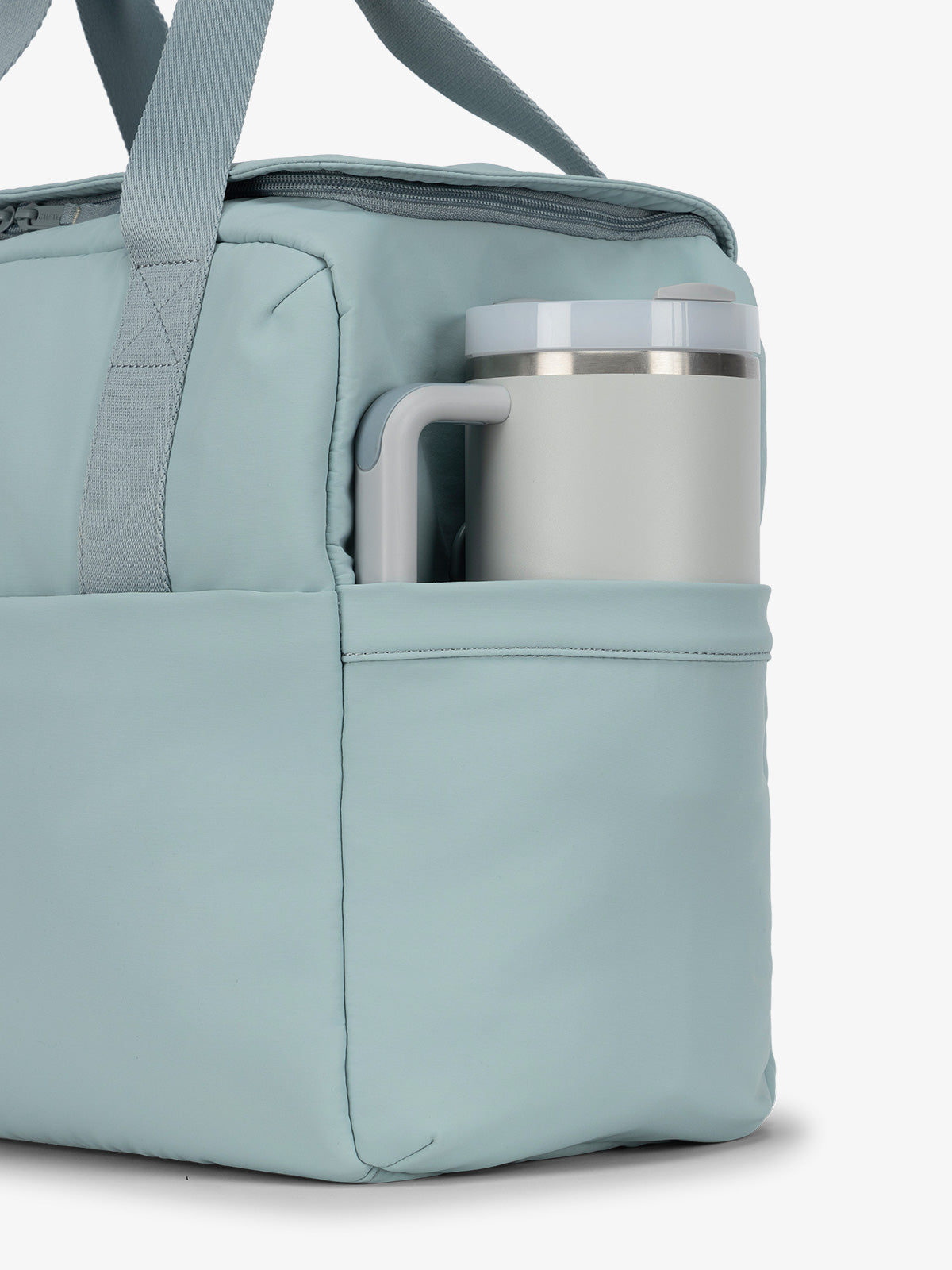 CALPAK Connect laptop duffel with large side water bottle pocket in blue; DCN2401-BLUEBELL