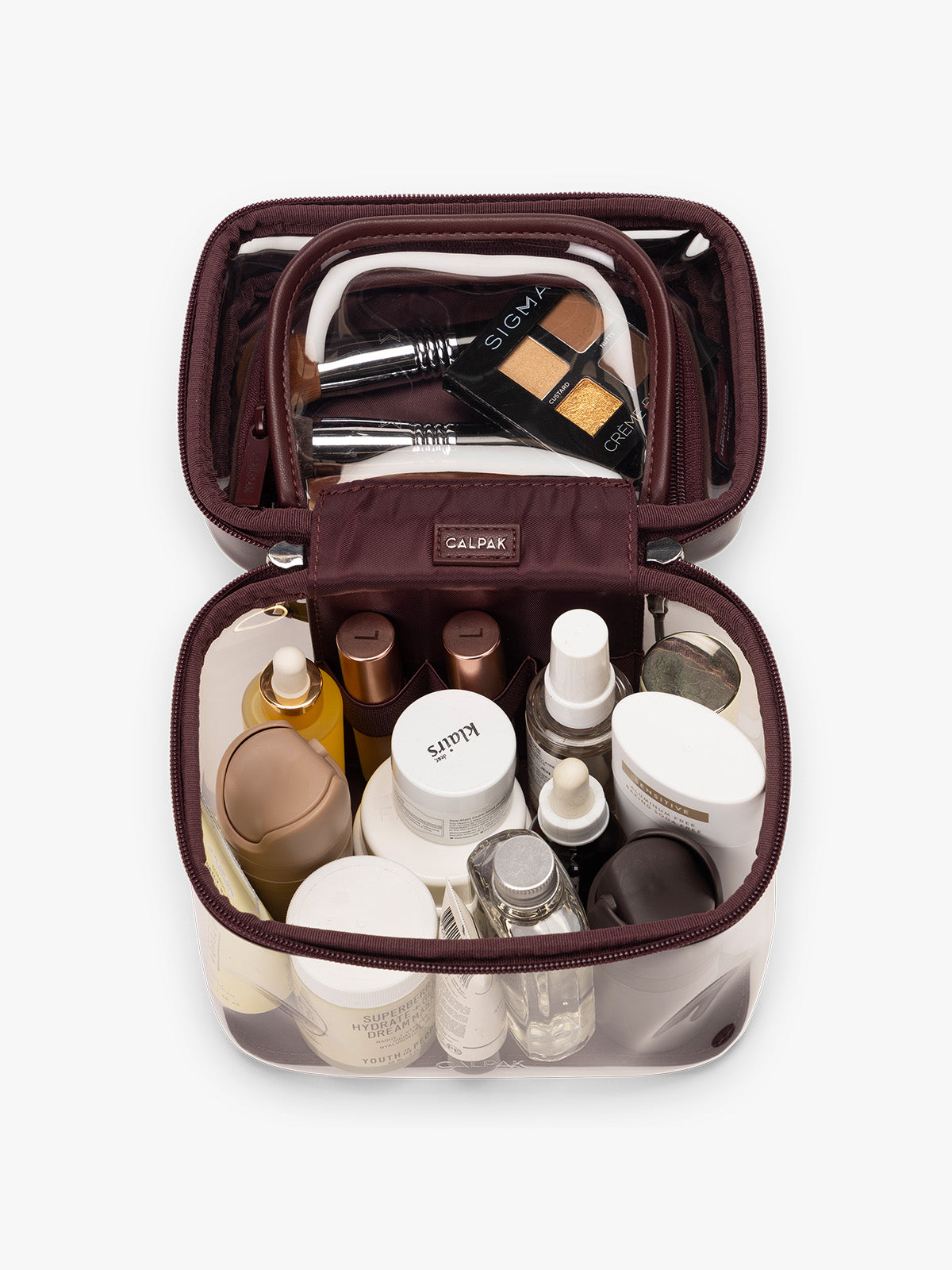 Toiletry and makeup bags in CALPAK Clear Train Case in maroon Glazed Dark Cherry; CTC2401-GLAZED-DARK-CHERRY