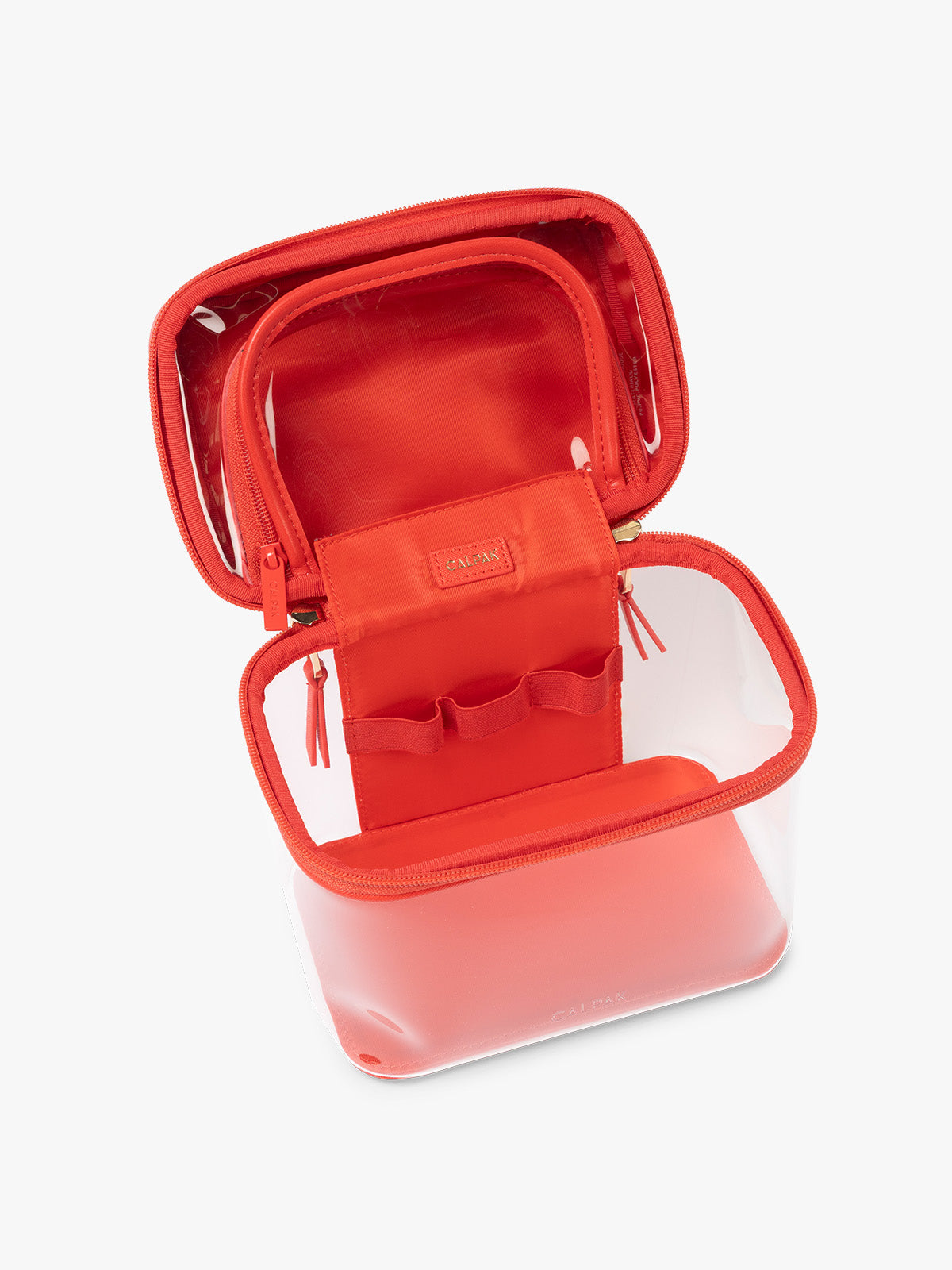 Opened view of CALPAK Clear Train Case in red Tomato; CTC2401-TOMATO
