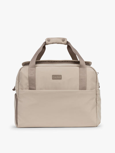 CALPAK Laptop Duffel in beige Greige front view with white background; DCN2401-GREIGE