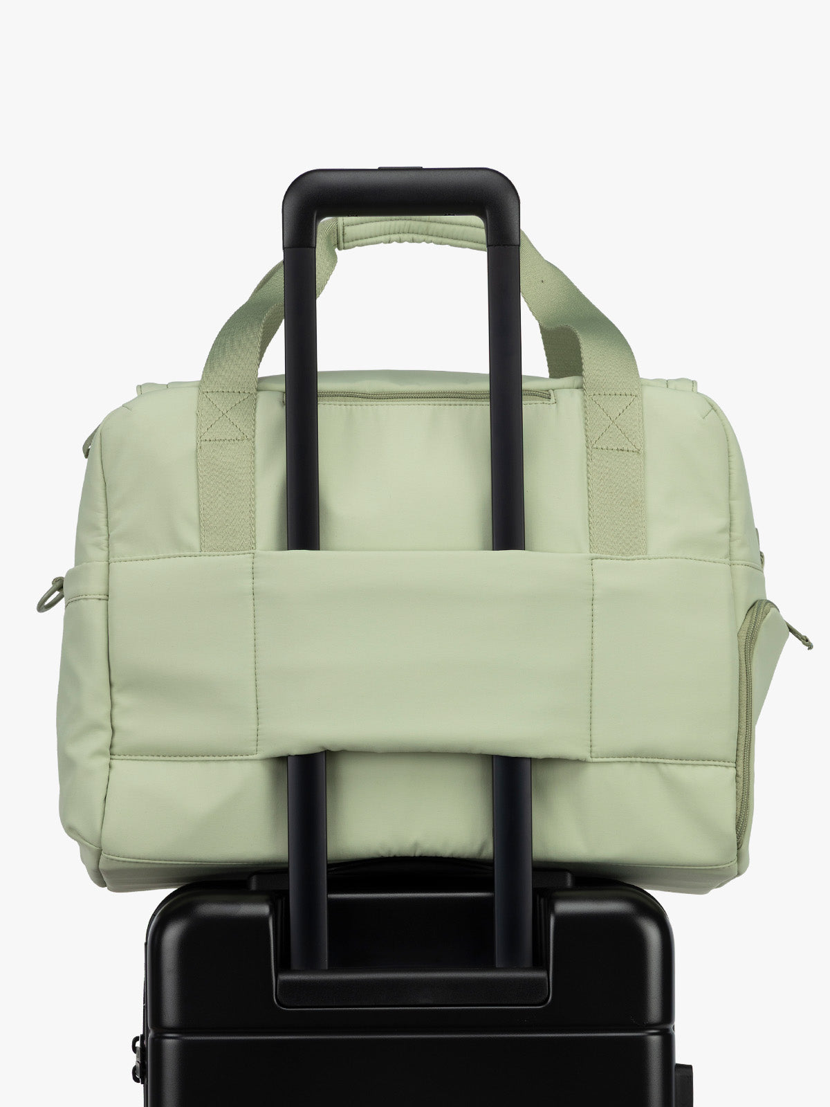CALPAK Laptop Duffel in light green Meadow luggage trolley sleeve with white background; DCN2401-MEADOW