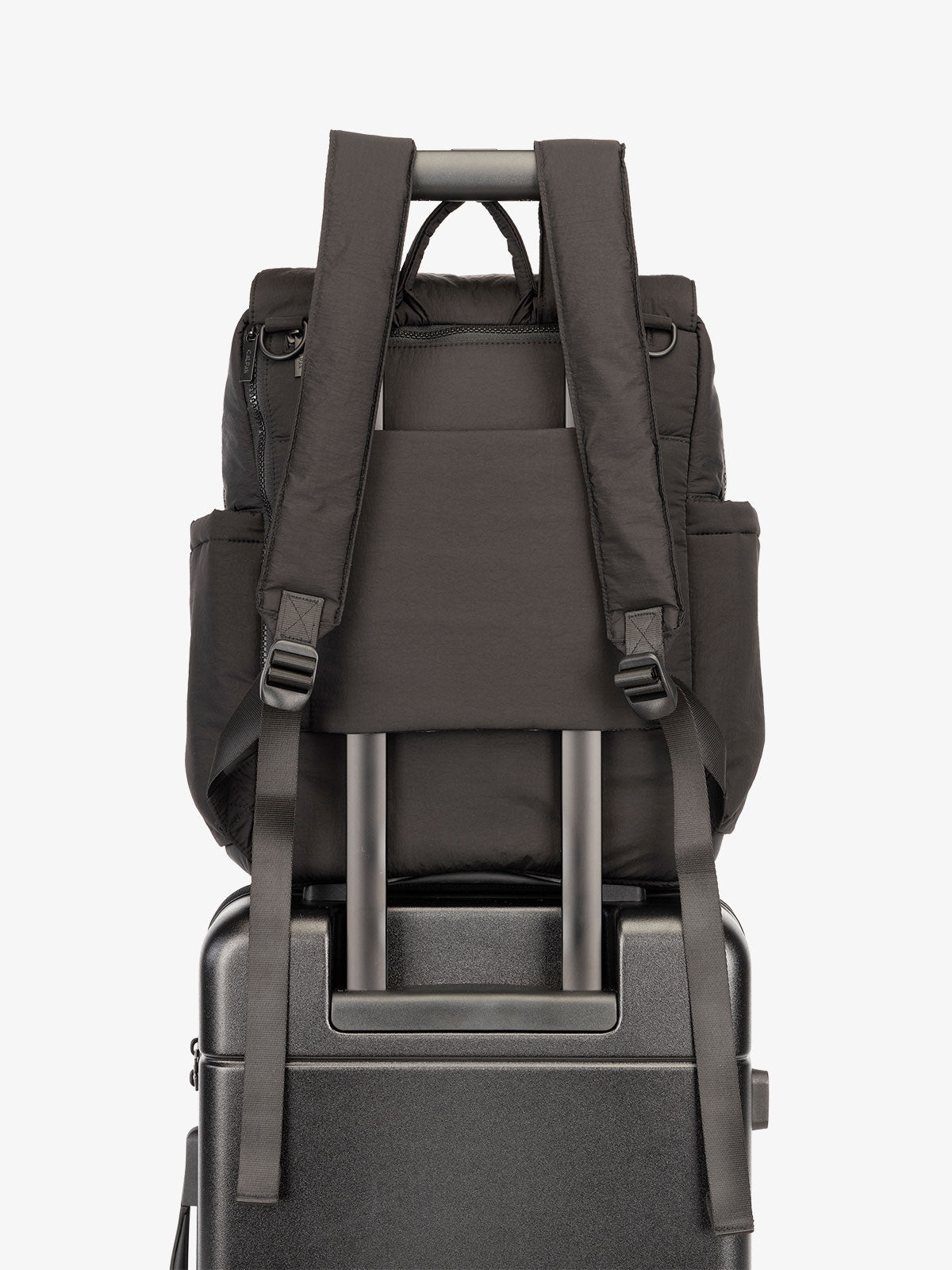CALPAK Diaper Backpack with Laptop Sleeve featuring luggage trolley sleeve with hidden pocket in black; BPB2401-BLACK, BBPB2401-BLACK