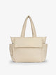 CALPAK Diaper Tote Bag with Laptop Sleeve made with durable, recycled, water-resistant material and a magnetic front pocket closure in oatmeal; TBB2401-OATMEAL