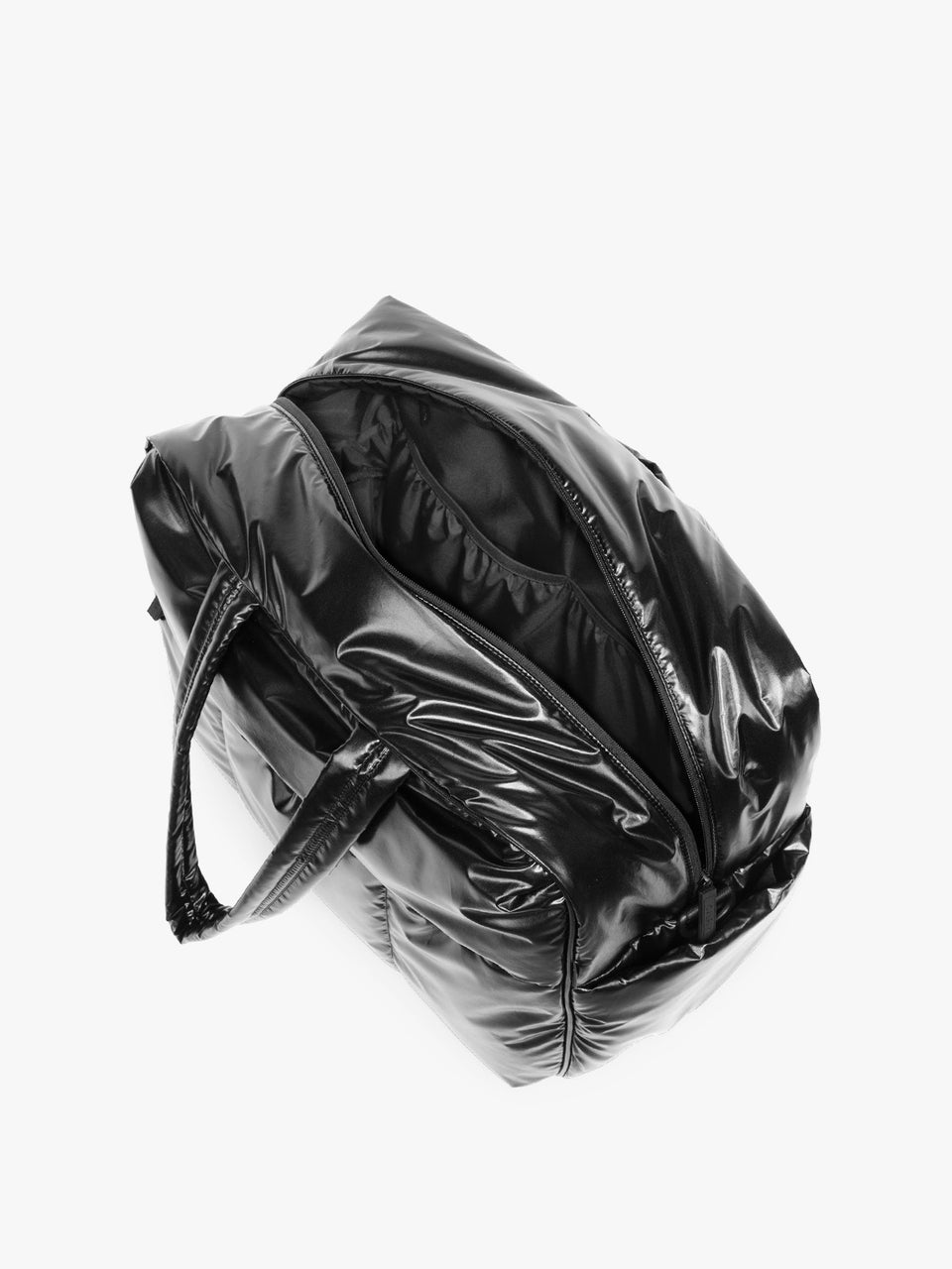 A glossy black puffer CALPAK Luka Large Duffel Bag with a shiny patent finish, shown from an overhead angle on a plain white background; DLL2201-GLAZED-BLACK
