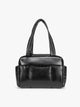 Black vegan leather CALPAK Luka Mini Duffel with dual top handles and side pockets, photographed against a clean white background; DLM2501-BLACK-PU