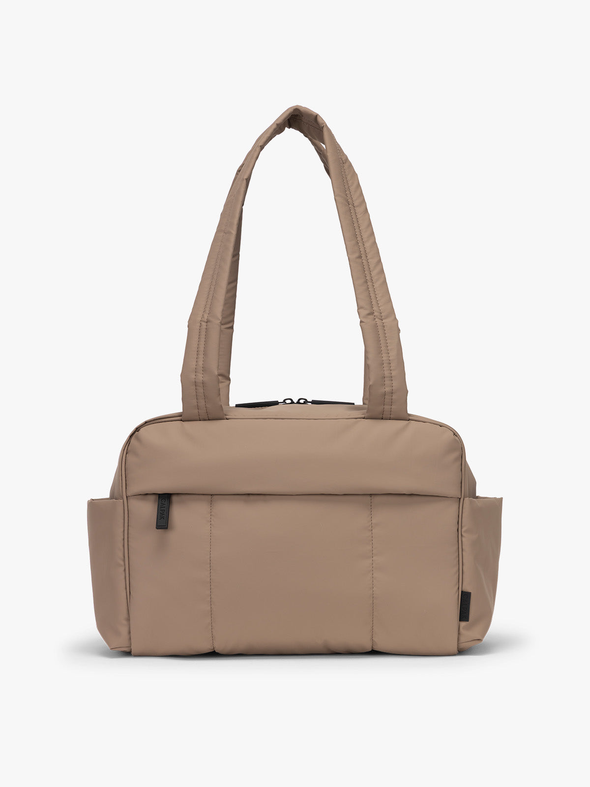 CALPAK Mini Duffel in brown Chocolate front view with puffy exterior, interior and exterior pockets, and padded shoulder straps; DLM2501-CHOCOLATE