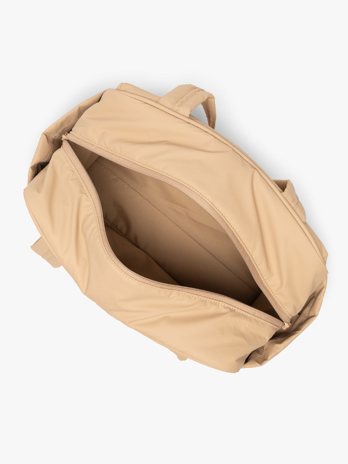 Opened interior of CALPAK Luka Mini Duffel in beige Latte on a white background; DLM2501-LATTE