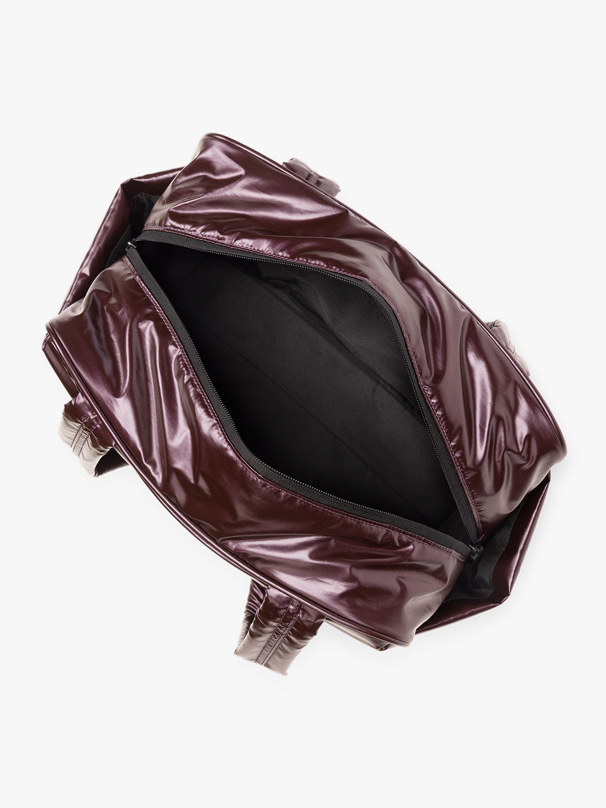 Opened view of CALPAK Luka Mini Duffel in maroon Glazed Dark Cherry on a white background; DLM2501-GLAZED-DARK-CHERRY