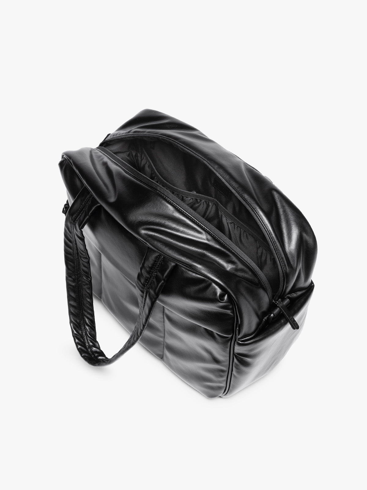 Top view with zipper open showing inside of A Black CALPAK Luka Duffel in vegan leather with dual top handles and a front zippered pocket, photographed against a clean white background; DSM1901-BLACK-PU