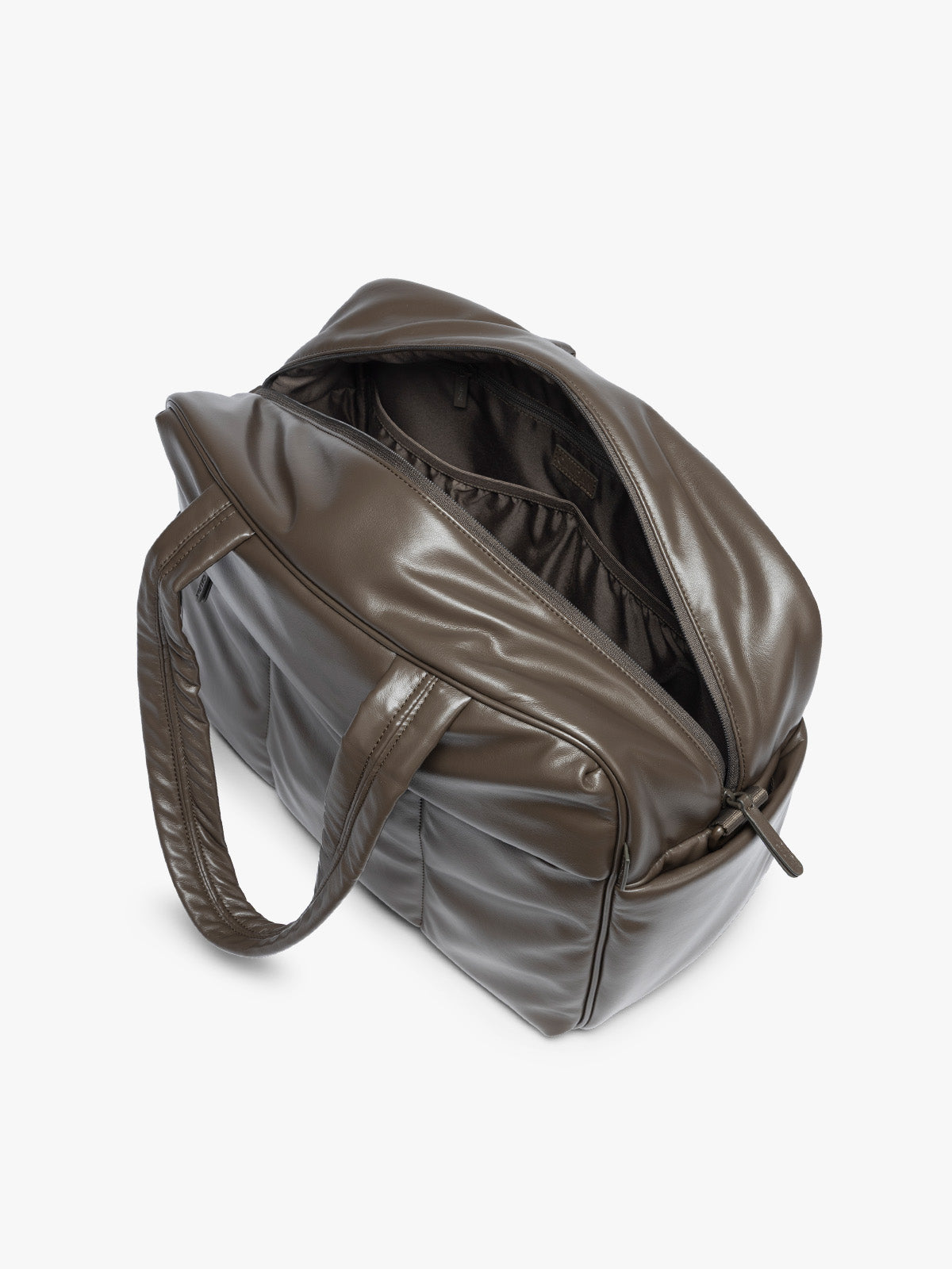 Top view with zipper open of the A dark brown Mushroom CALPAK Luka Duffel in vegan leather with dual top handles and a front zippered pocket, photographed against a clean white background; DSM1901-MUSHROOM-PU