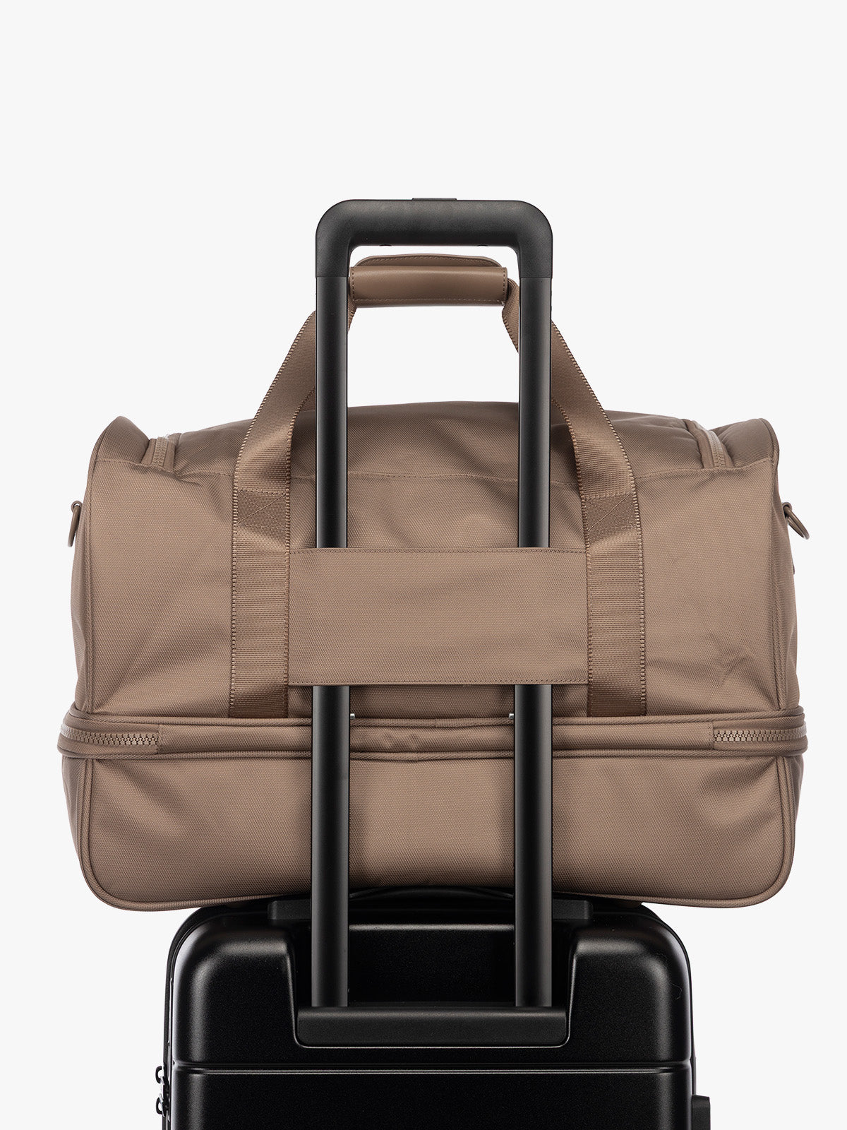 Luggage trolley sleeve of CALPAK Stevyn Duffel with Shoe Compartment in brown Chocolate; DST7019-CHOCOLATE