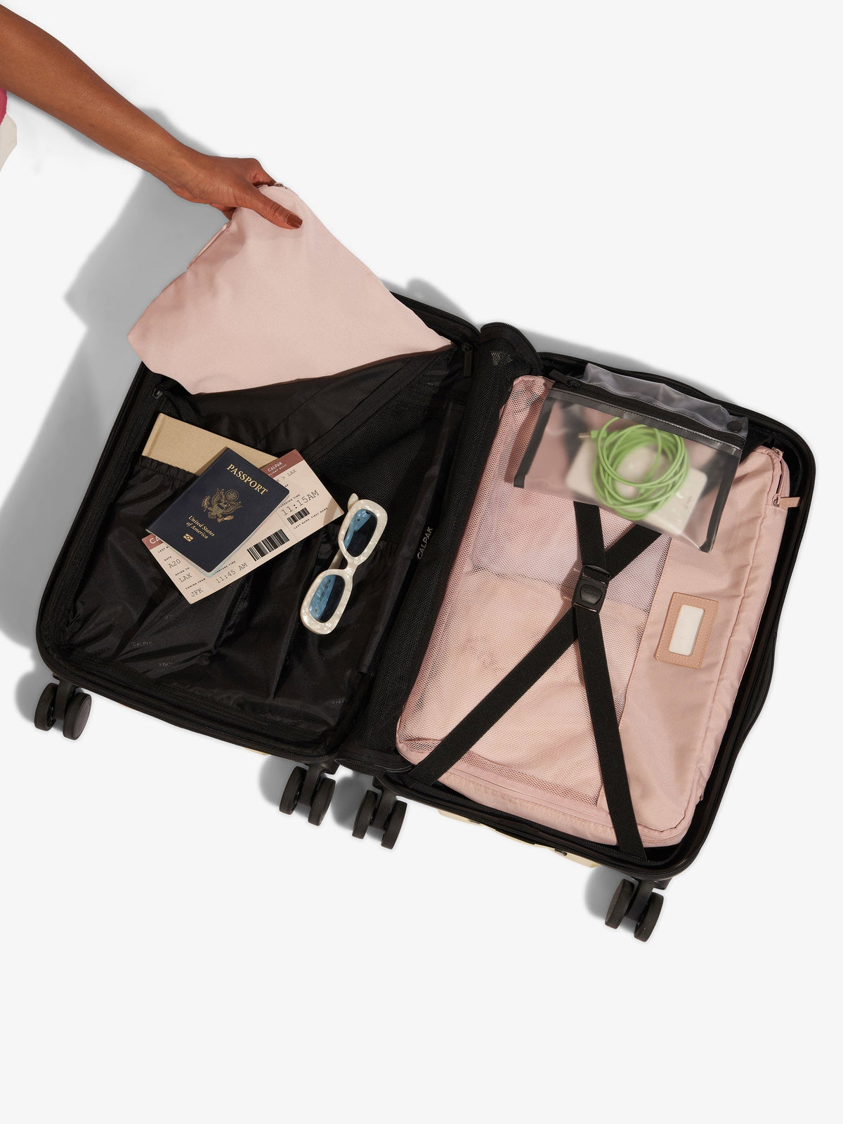 CALPAK Evry Carry-On Luggage with items inside; LCO1020-PACIFIC, LCO1020-CHOCOLATE, LCO1020-PISTACHIO, LCO1020-BLACK, LCO1020-SMOKE, LCO1020-BUTTER, LCO1020-PERSIMMON, LCO1020-RASPBERRY