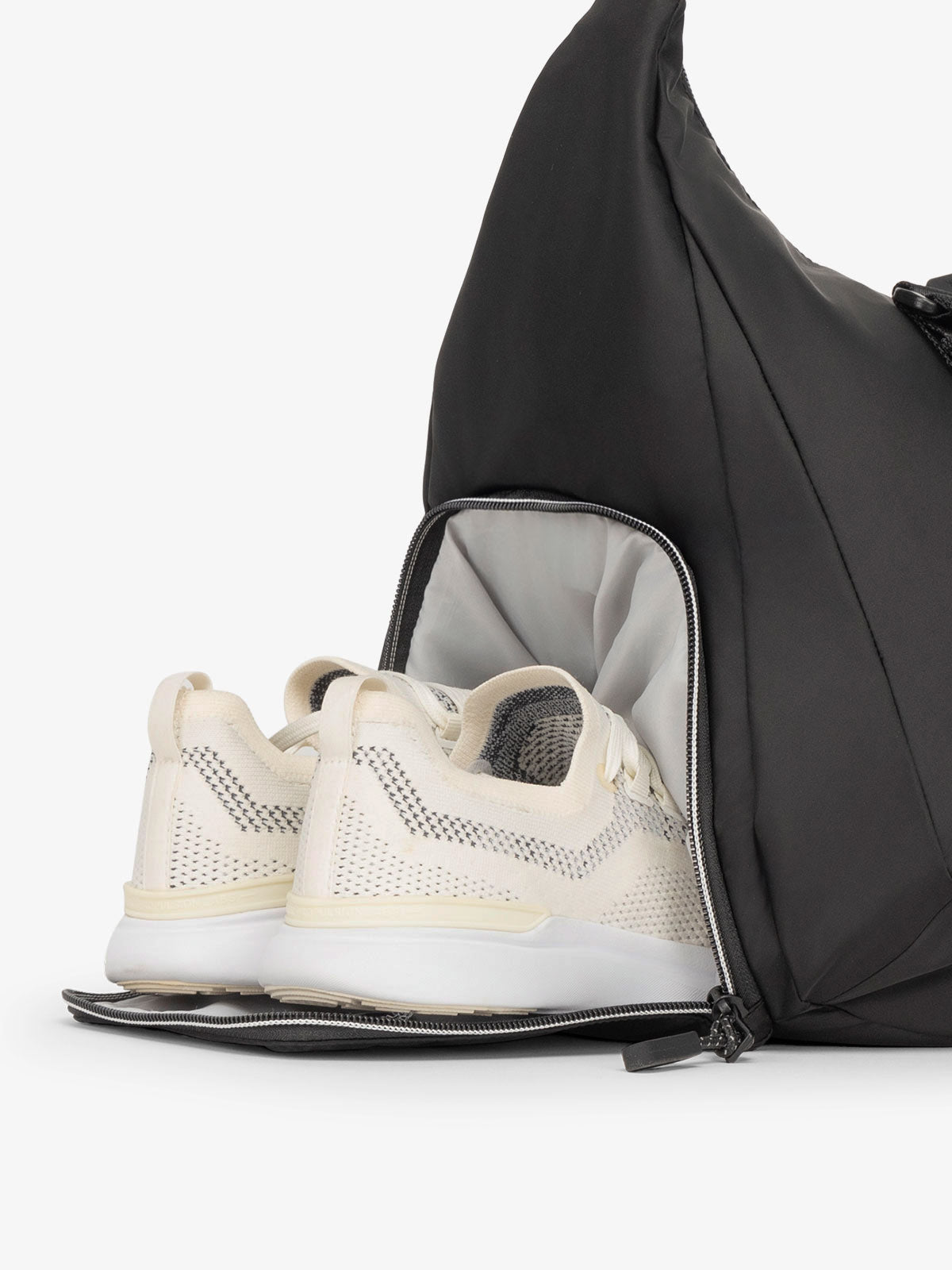 CALPAK Fit sling gym bag with separate shoe compartment in black; TBF2401-BLACK, TBF2401-BLACK-GRIN, BTBF2401-BLACK