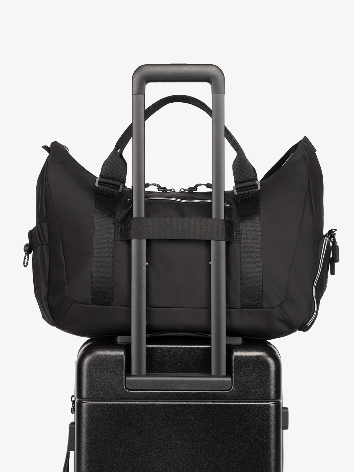 CALPAK Fit gym duffel bag with luggage trolley sleeve in black; TBF2401-BLACK, TBF2401-BLACK-GRIN, BTBF2401-BLACK