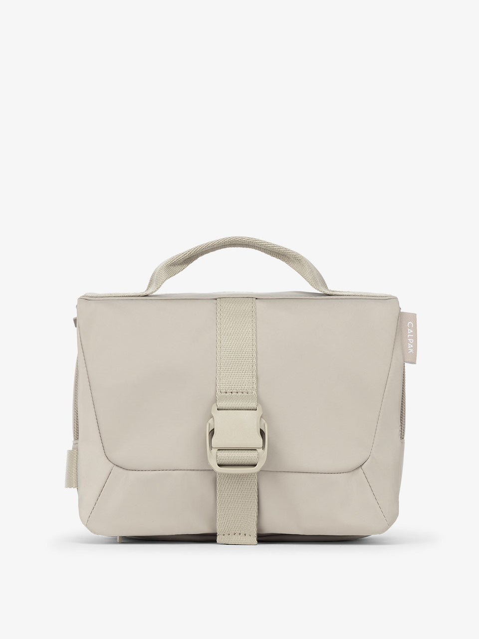 Front view of CALPAK Fit Hanging Dopp Kit made of recycled polyester and features a buckle front closure in greige; TFH2401-GREIGE, TFH2401-GREIGE-GRIN