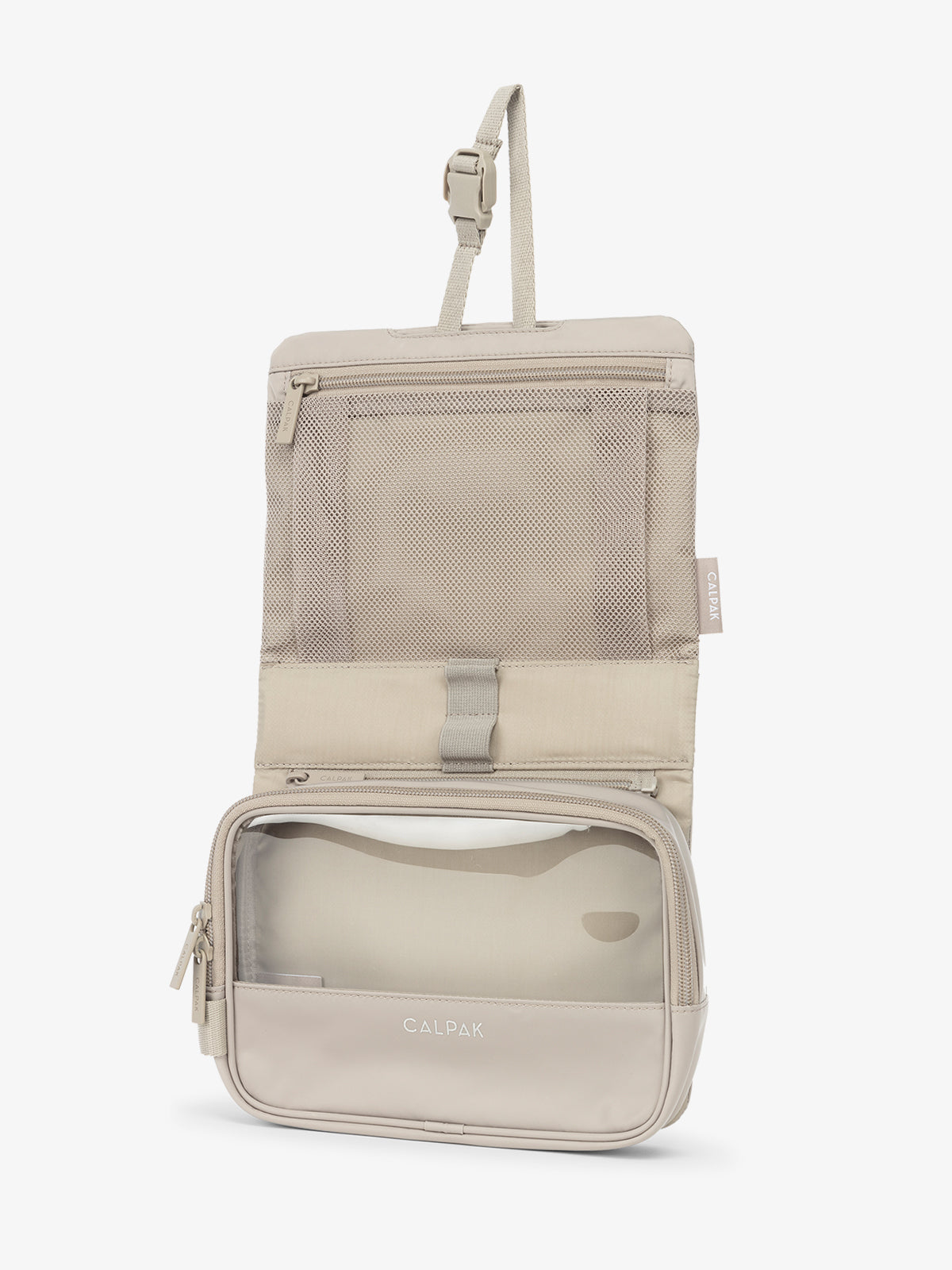 CALPAK Fit Hanging Dopp Kit with collapsible hanging hook and multiple interior mesh pockets in grayish beige; TFH2401-GREIGE, TFH2401-GREIGE-GRIN, BTBF2401-GREIGE