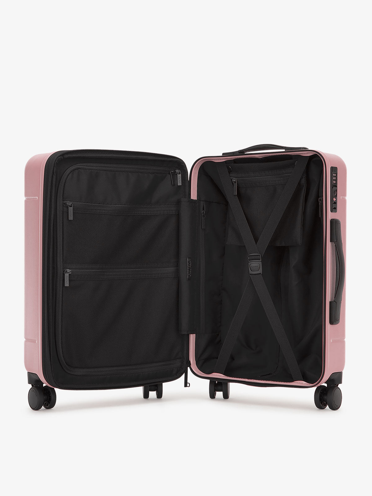 Interior of  CALPAK Hue Medium Luggage with front pocket and compression straps in mauve; LHU1024-MAUVE