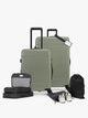 CALPAK Hue Starter Bundle in green Juniper that comes with Large and Carry On Luggage, Luggage Tag, Two Black Pouches, and Three Black Packing Cubes shown on a white background; LHU8000-JUNIPER