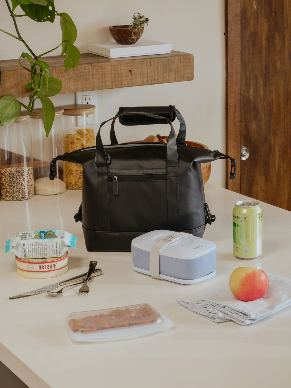 CALPAK Insulated 8L Soft-Sided Cooler on table in black; ISCS2401-BLACK