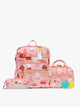 Colorful CALPAK + Miffy Kids Essentials Set with children's Medium backpack, lunch bag , pencil case set on a white background with pink accents and Miffy with other animals; BCKM5000-MIFFY-PINK-ZOO-TRIP