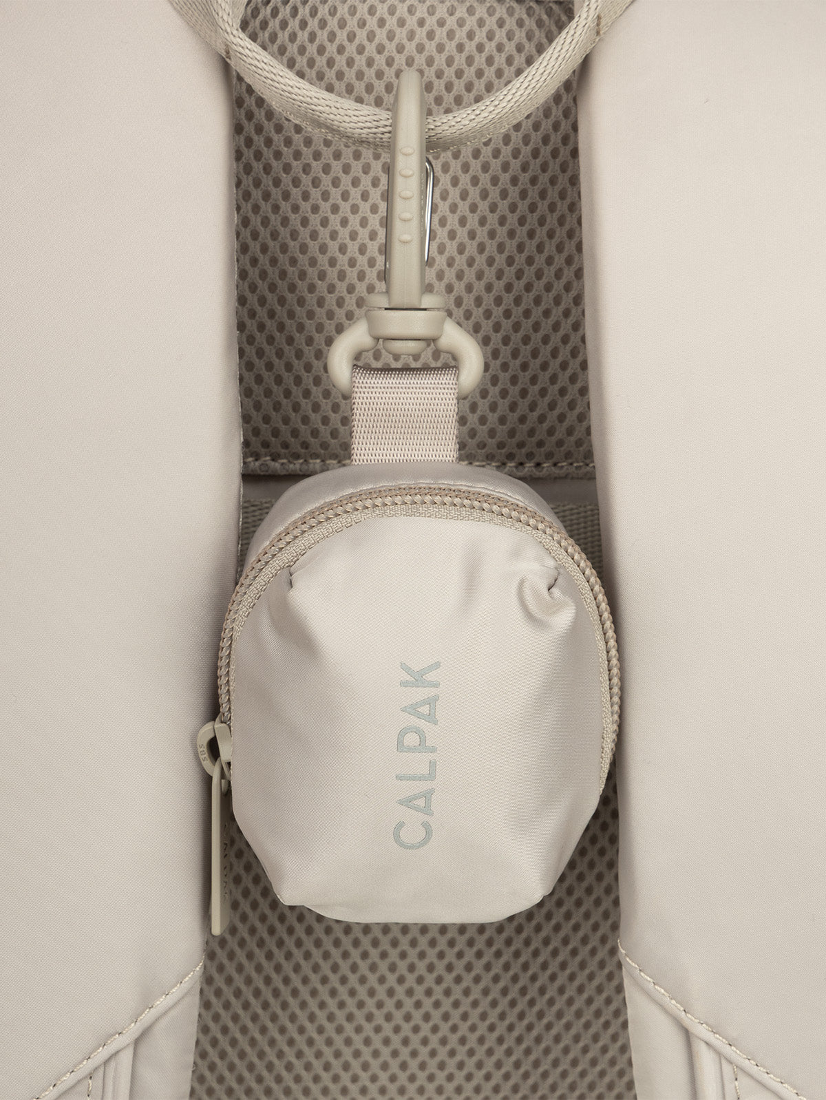 CALPAK Fit Zip Bag Charm in grey beige Greige with hook and zipper hooked on bag; KPF2601-GREIGE