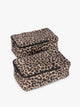 Closed zipper view of the tan and black animal print Leopard rectangular CALPAK shoe cube with zippers and top handle shown on a plain background; KSB2001-LEOPARD