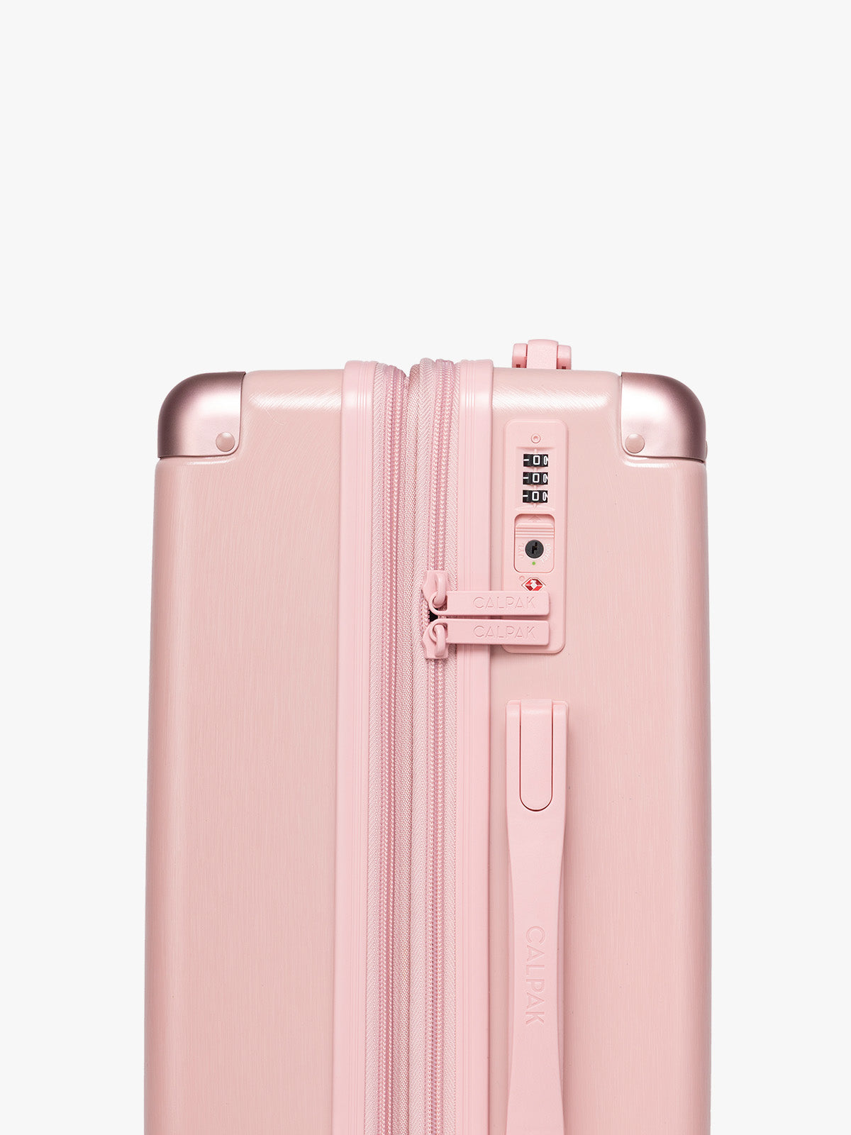 TSA-aproved CALPAK 2pc Ambeur Luggage Set featuring the Ambeur Carry-On Luggage and Ambeur Large Luggage in metallic pink Blossom with pink wheels;  LAM2000-BLOSSOM