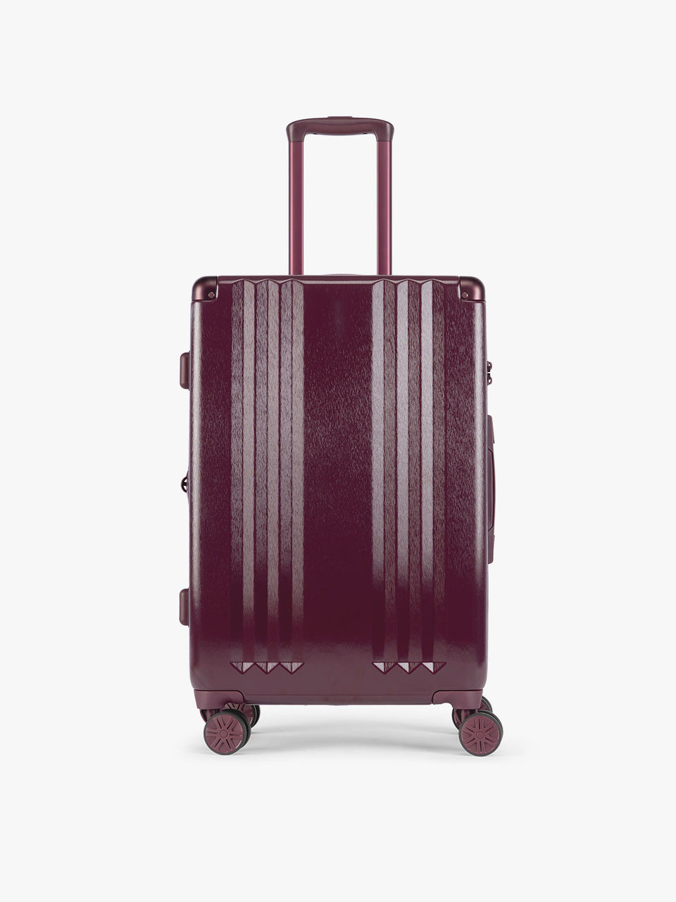 CALPAK Ambeur Medium Luggage in dark burgundy Dark Cherry with vertical ribbed detailing and an extended telescoping handle, shown from the front against a plain white background; LAM1024-DARK-CHERRY