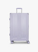 CALPAK Ambeur Large Luggage in light lavender purple with handles and spinner wheels on a white background; LAM1028-SEA-GLASS