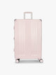 CALPAK Ambeur Large Luggage in light pink in Shell Pink with handles and spinner wheels; LAM1028-SHELL-PINK