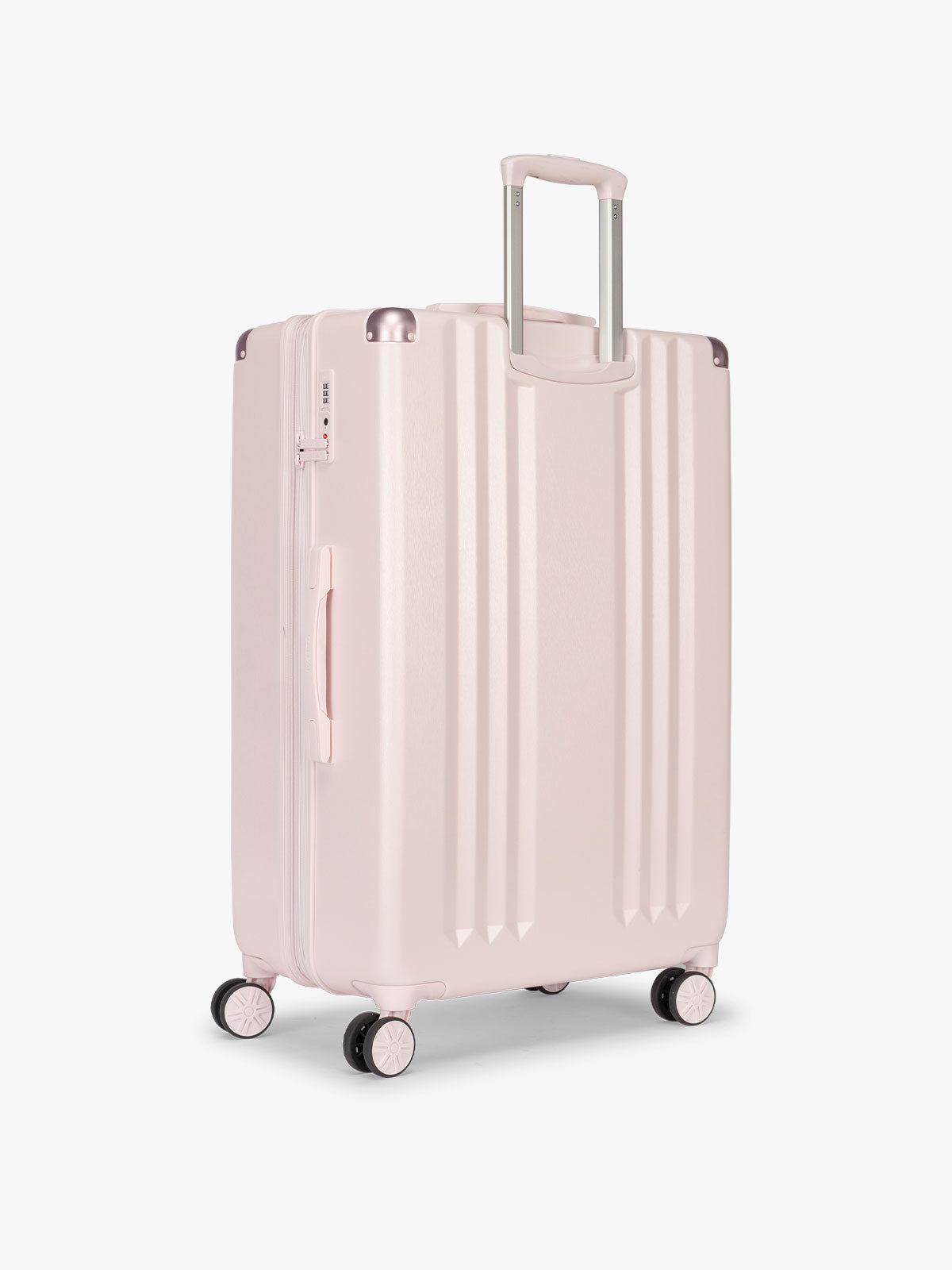 Backside of CALPAK Ambeur Large Luggage in light pink in Shell Pink with handles and spinner wheels; LAM1028-SHELL-PINK