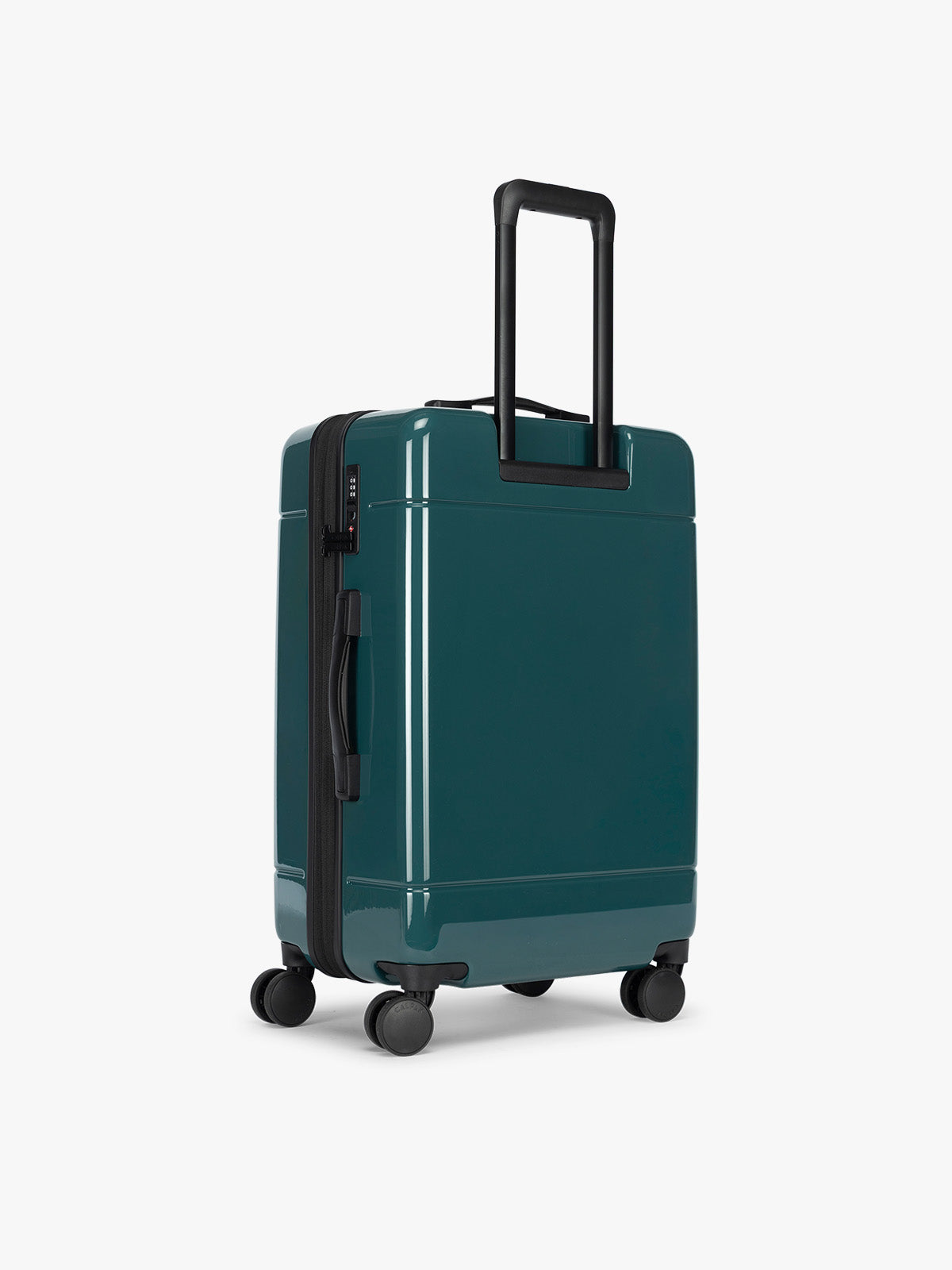 Backside of CALPAK Hue Medium Luggage in dark green Kale; LHU1024-GLAZED-KALE