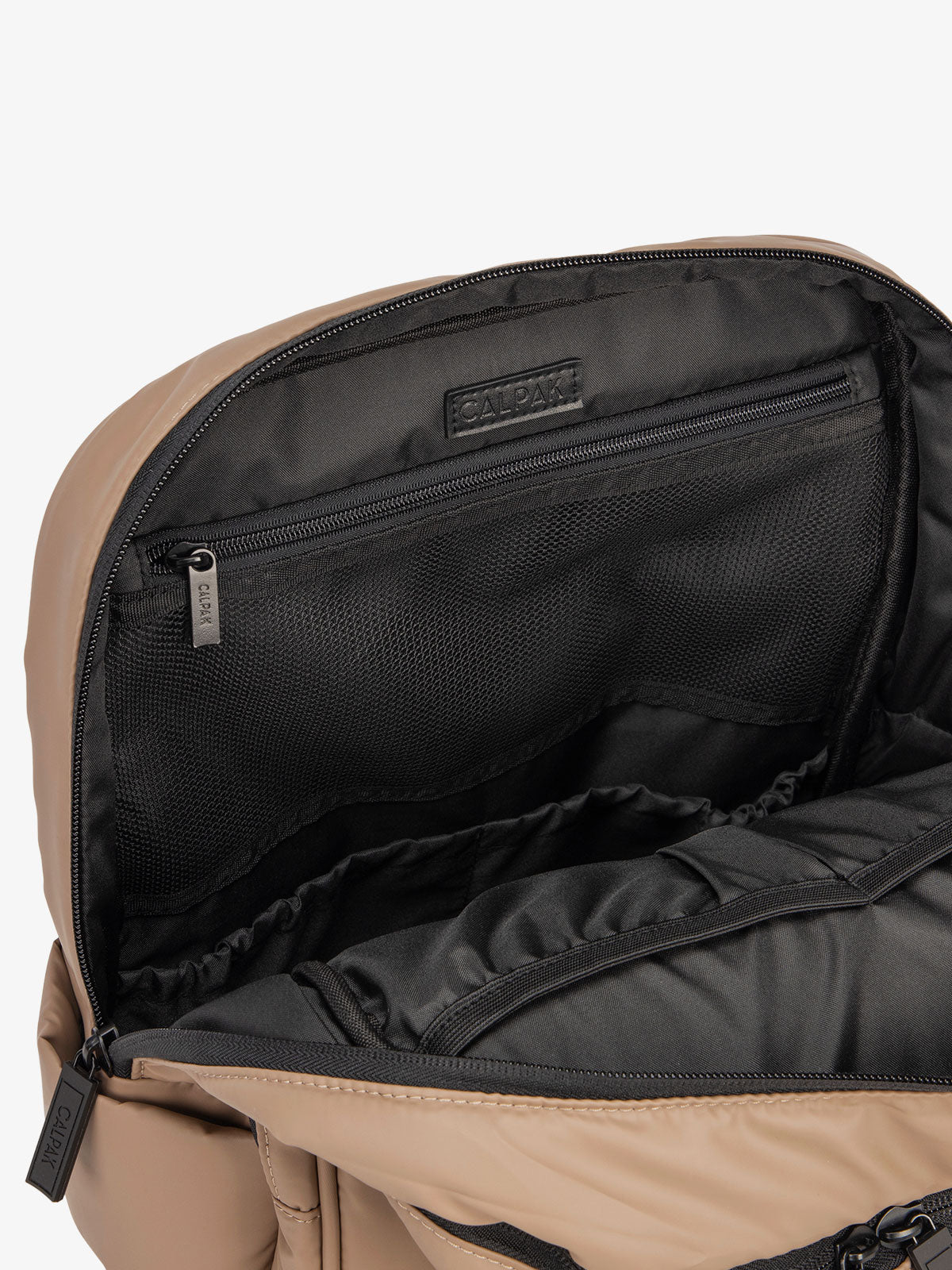 Close up of main compartment of CALPAK laptop backpack with multiple interior pockets in chocolate; BPX2301-CHOCOLATE