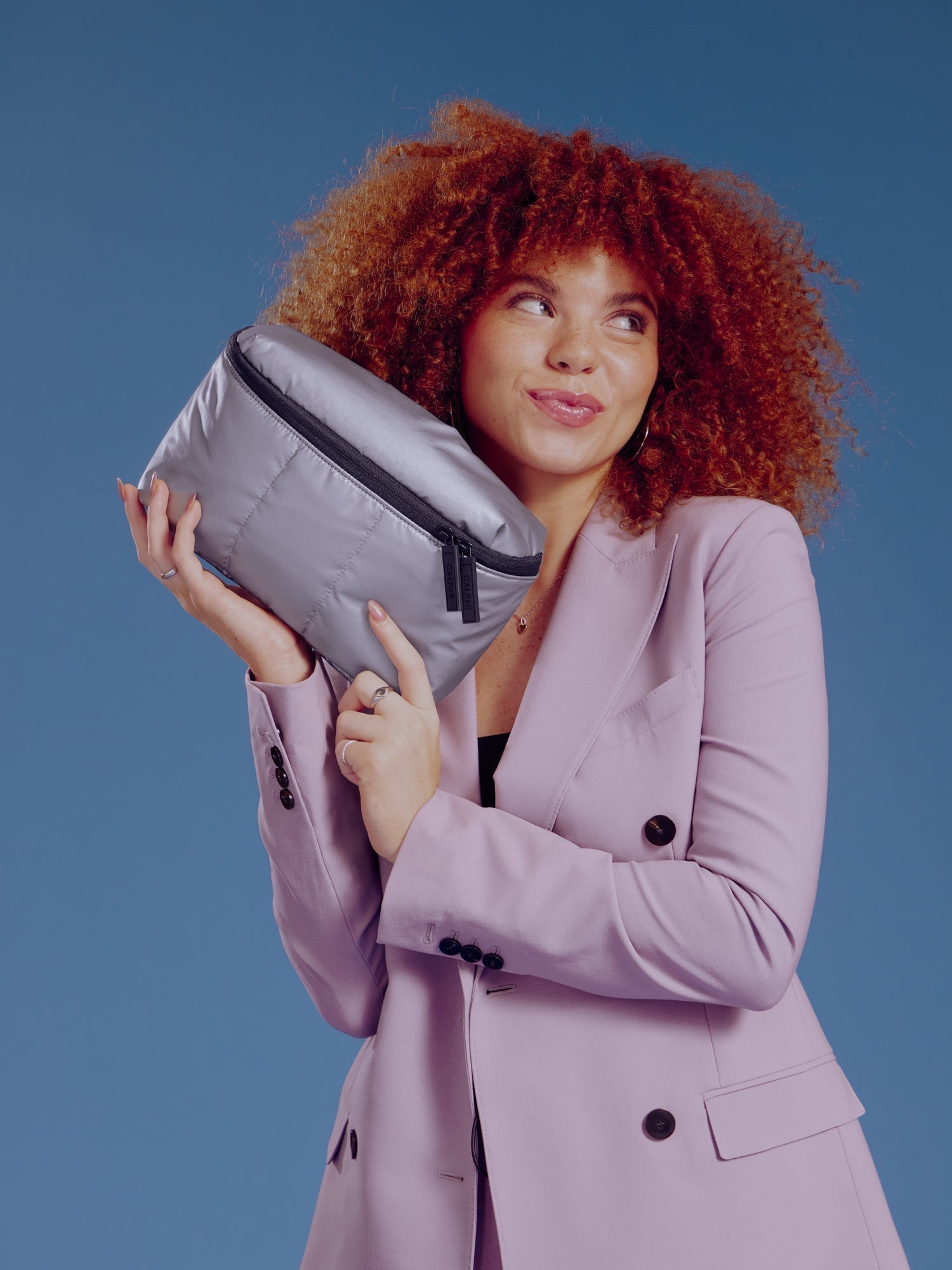 Model holding CALPAK Luka Belt Bag in gunmetal; BB1901-GUNMETAL