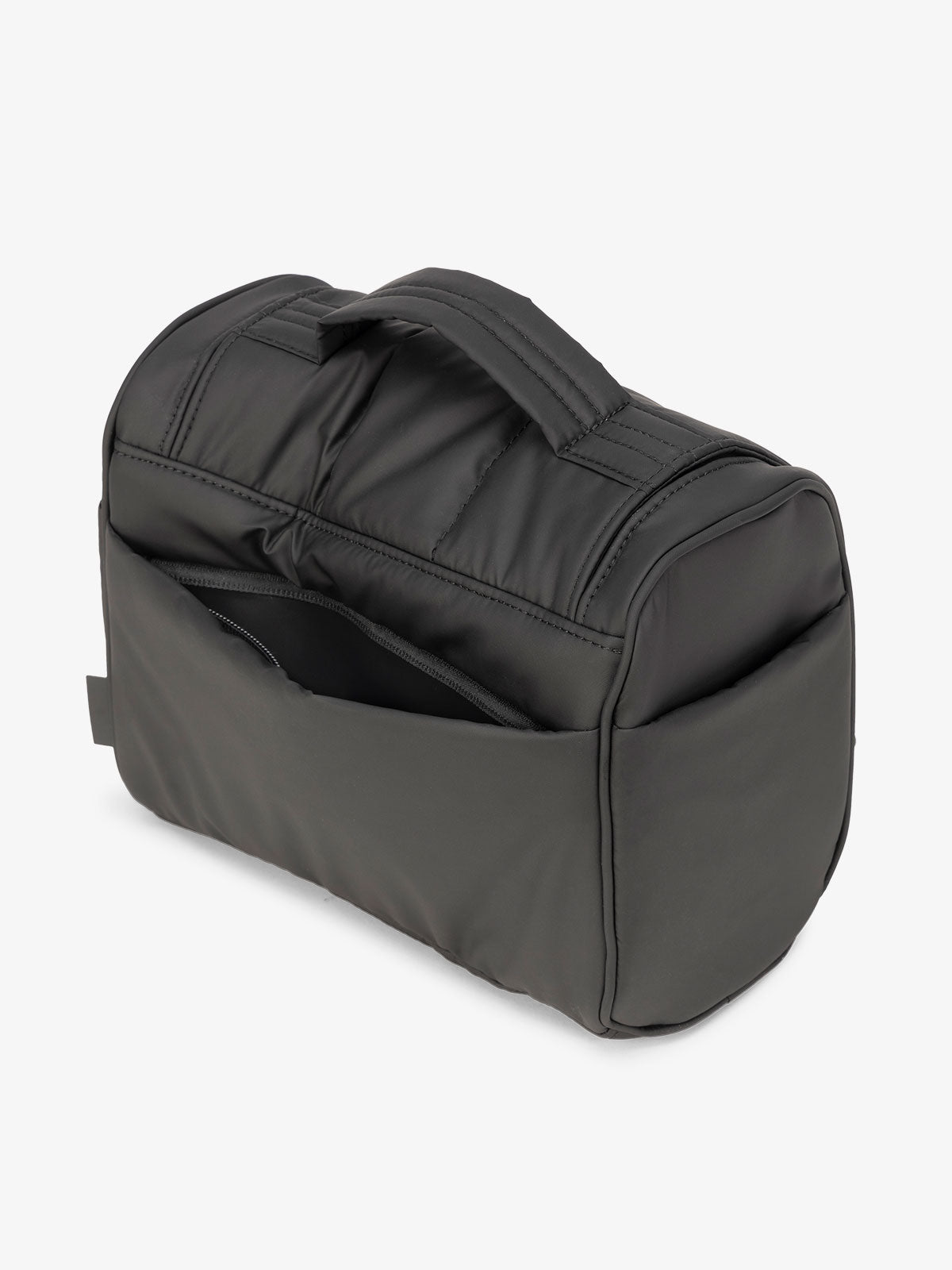 Matte black CALPAK Luka Hanging Toiletry Bag featuring additional secure zippered back pocket; TLH2301-MATTE-BLACK