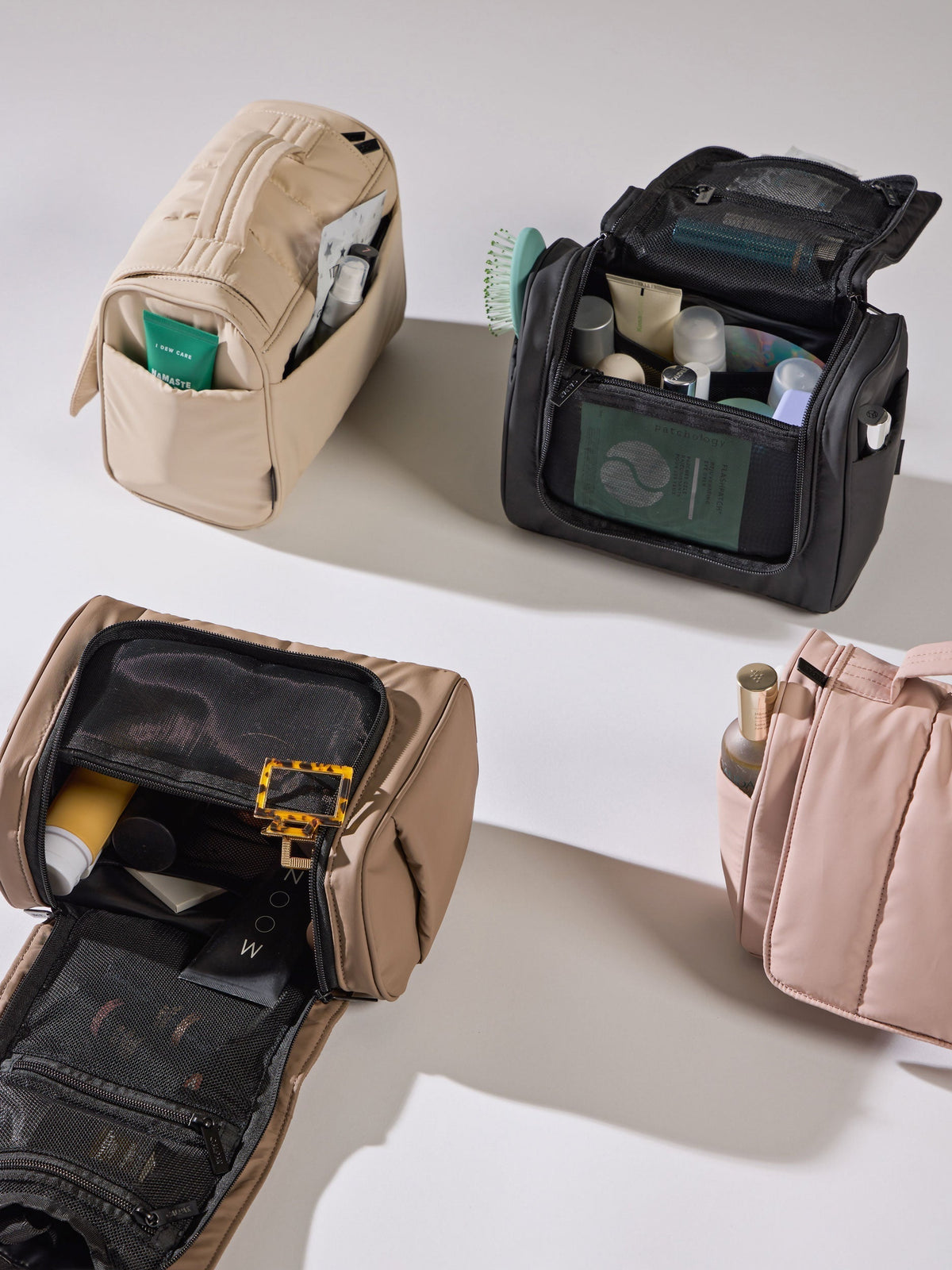 CALPAK Luka Hanging Toiletry Bags in matte black, rose quartz, chocolate, and oatmeal; TLH2301-MATTE-BLACK