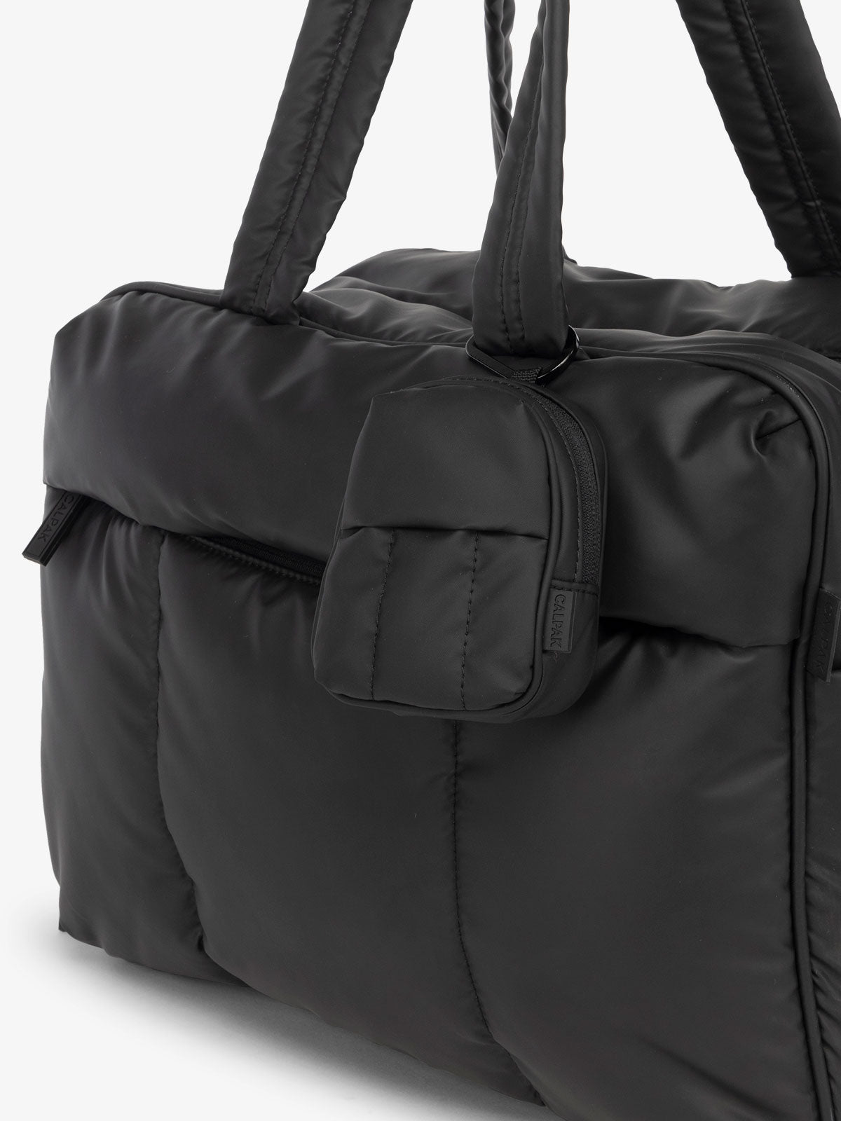 CALPAK Luka mini backpack keychain attached to duffel with soft, water-resistant exterior in black; AMB2201-MATTE-BLACK