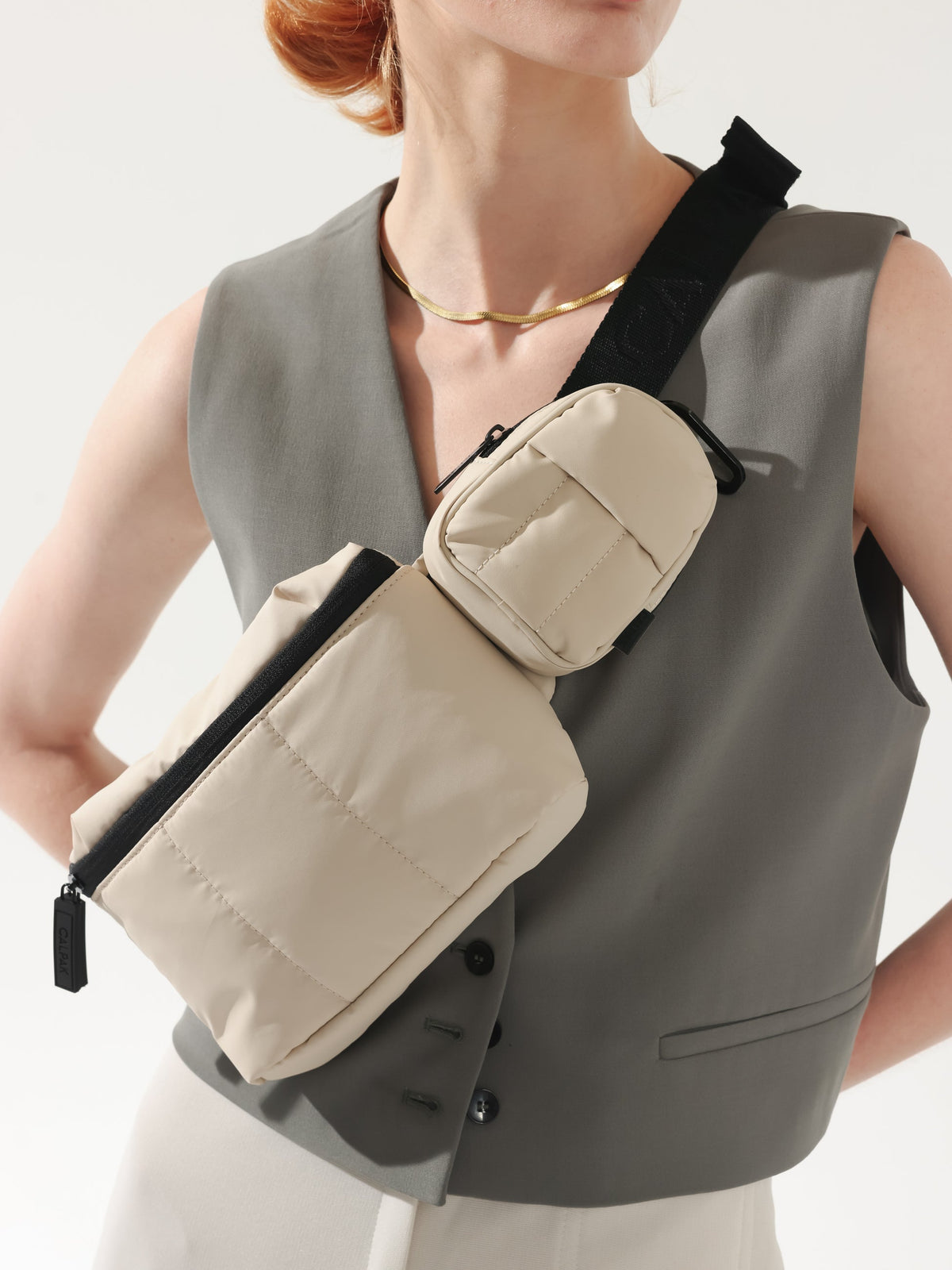 CALPAK Luka backpack key chain with back versatile elastic wrist strap in cream; AMB2201-OATMEAL