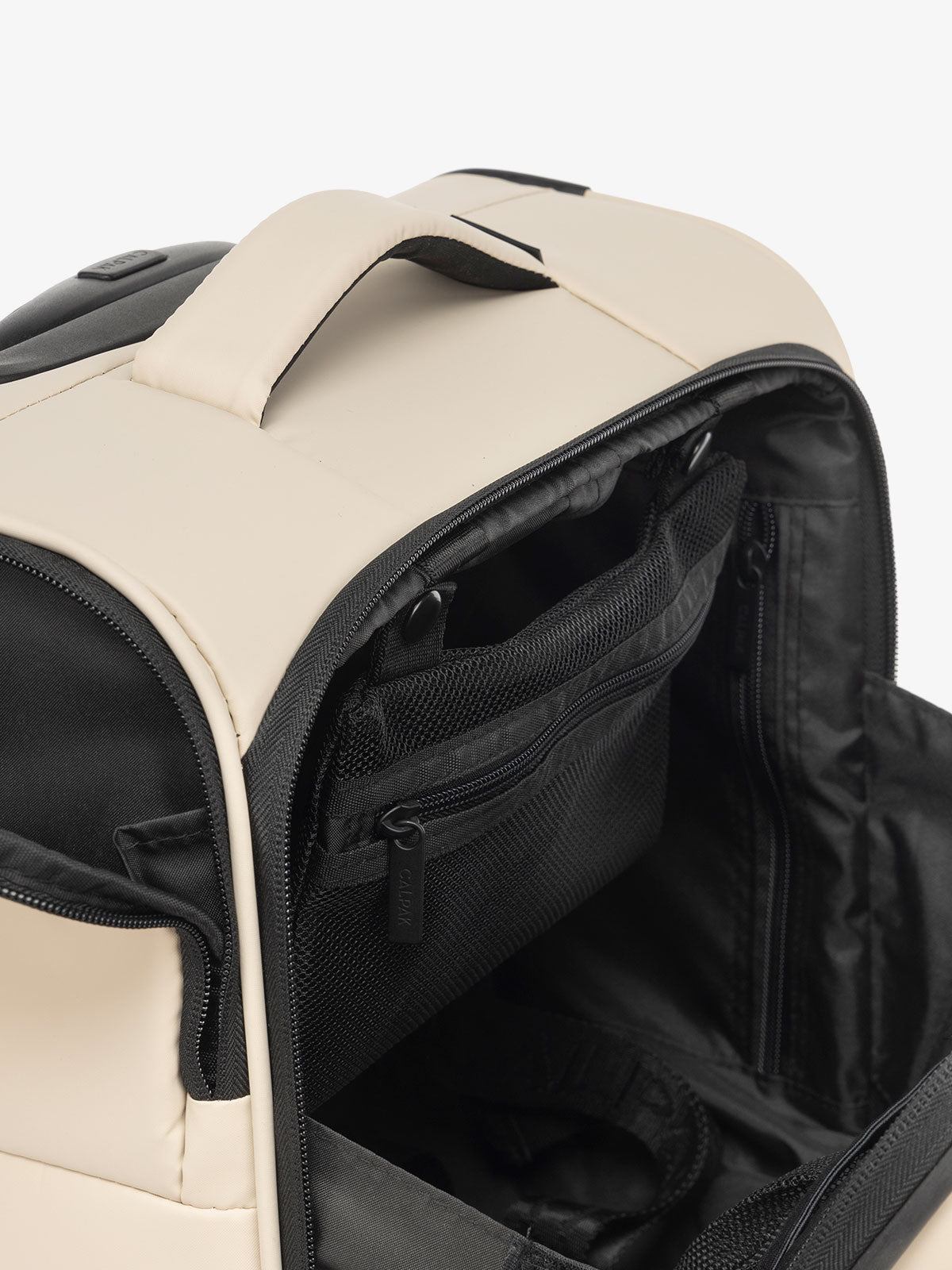 CALPAK Luka mini soft sided luggage interior pockets and top handle in ivory; LSM1014-OATMEAL