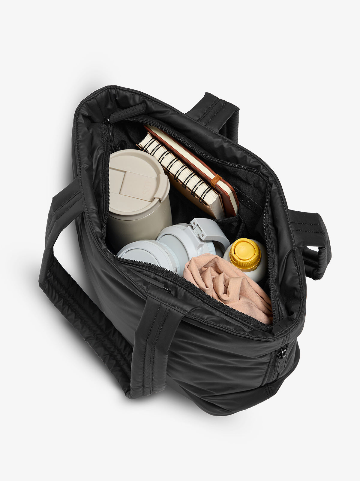 CALPAK luka mini tote with multiple interior pockets and water-resistant lining in black; ALM2401-MATTE-BLACK