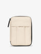 CALPAK Luka Zippered Passport Wallet with soft, puffy exterior in beige oatmeal; PZW2301-OATMEAL