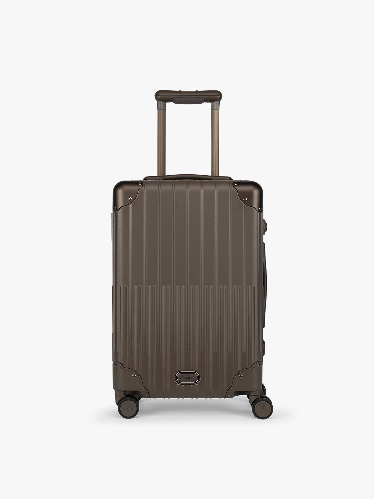 CALPAK Vault brown Mushroom hard-shell spinner Carry On Luggage with a telescoping handle extended, featuring a black leatherette side handle and trim, set against a plain light gray background; LVT1020-MUSHROOM