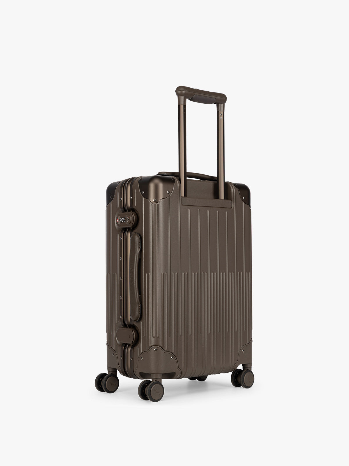 Backside of CALPAK Vault brown Mushroom hard-shell spinner Carry On Luggage with a telescoping handle extended, featuring a black leatherette side handle and trim, set against a plain light gray background; LVT1020-MUSHROOM