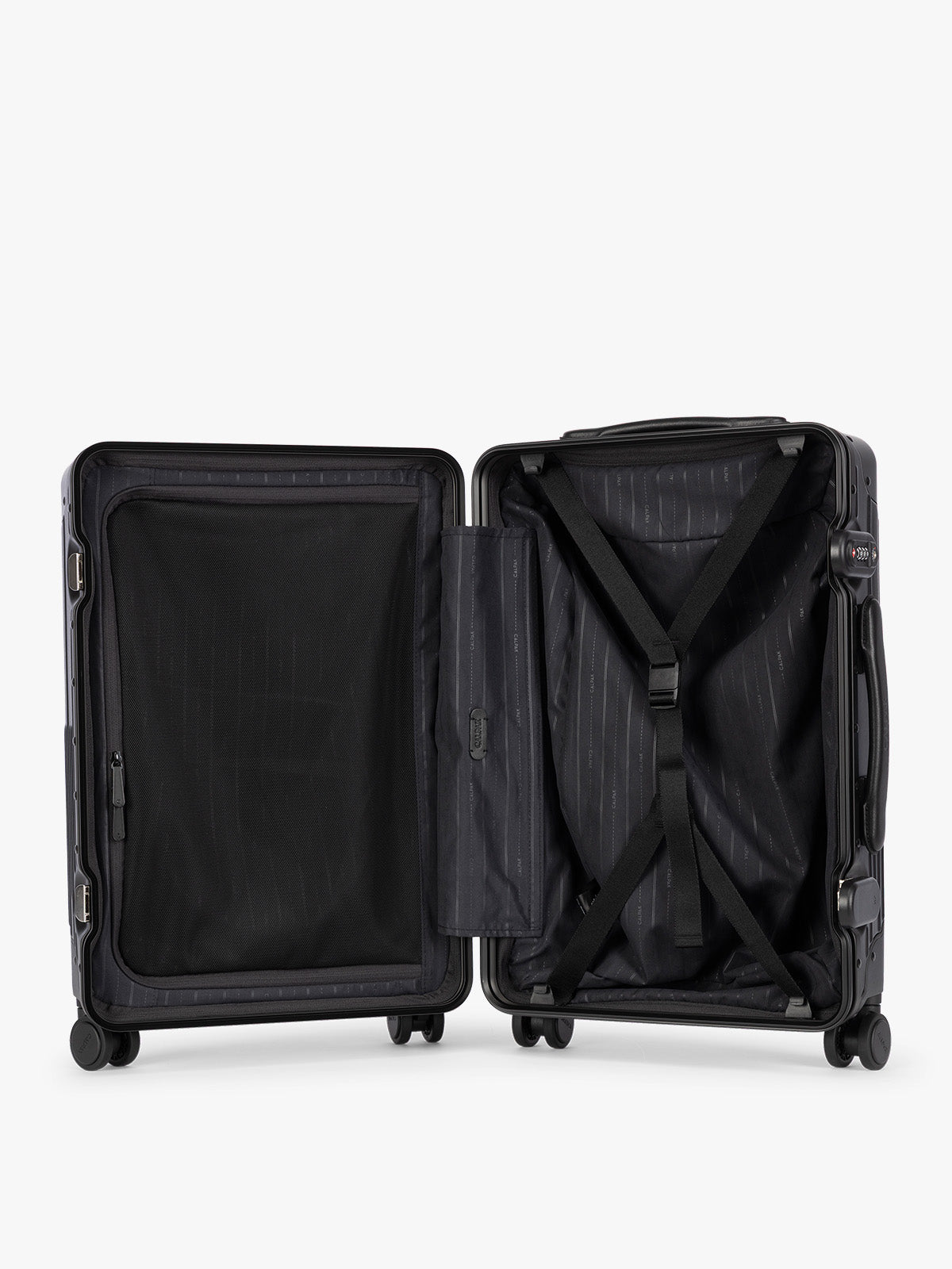 Opened CALPAK Vault black Onyx hard-shell spinner Carry On Luggage with a telescoping handle extended, featuring a Black leatherette side handle and trim, set against a plain light gray background; LVT1020-ONYX